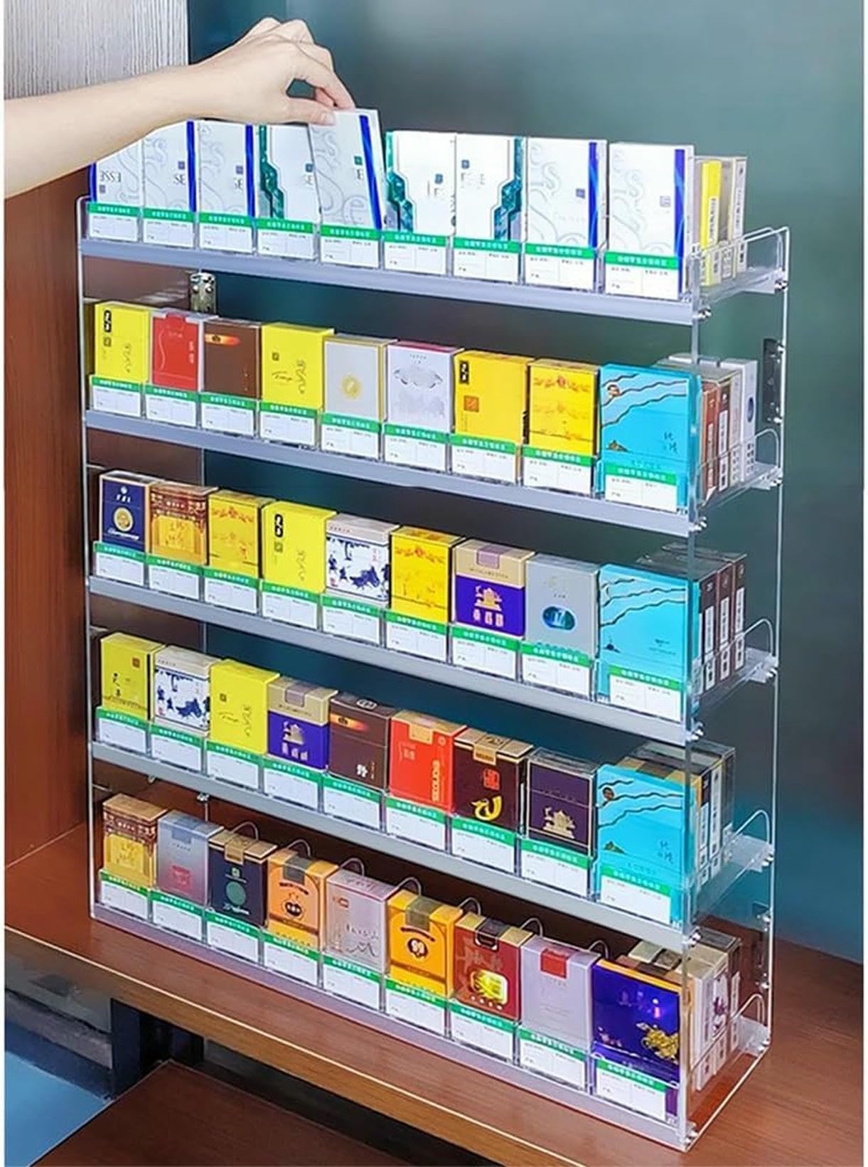 Présentoir automatique transparent pour ranger cigarettes et bonbons sans désordre
