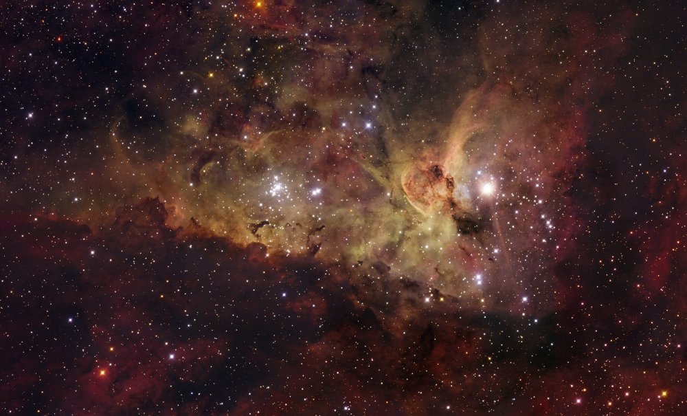 Posterazzicolorful southern nebula Poster Print by the powerful and enigmatic star Eta Carinae (right side of the image), (17 x 10)