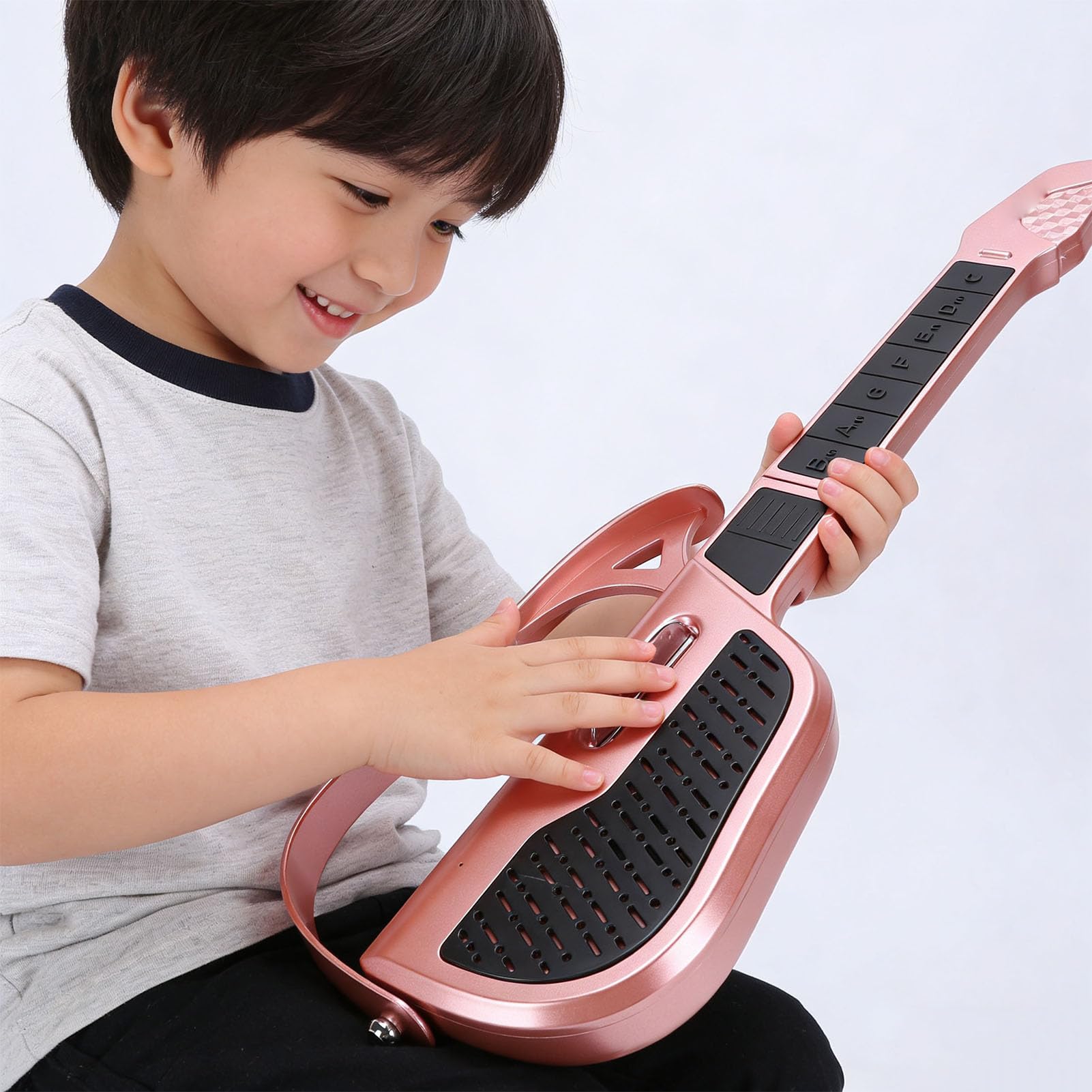 Bewinner Guitarra para Niños Instrumento Inteligente sin Cuerdas con Ajuste Automático de Tono para Principiantes Diseño Plegable Portátil Hecho de Plástico Seguro 58x12cm (Rojo)