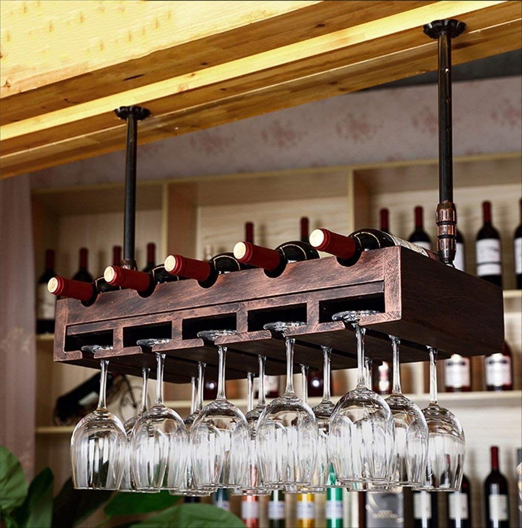 Soporte de vidrio al revés para crear un bar retro en tu salón