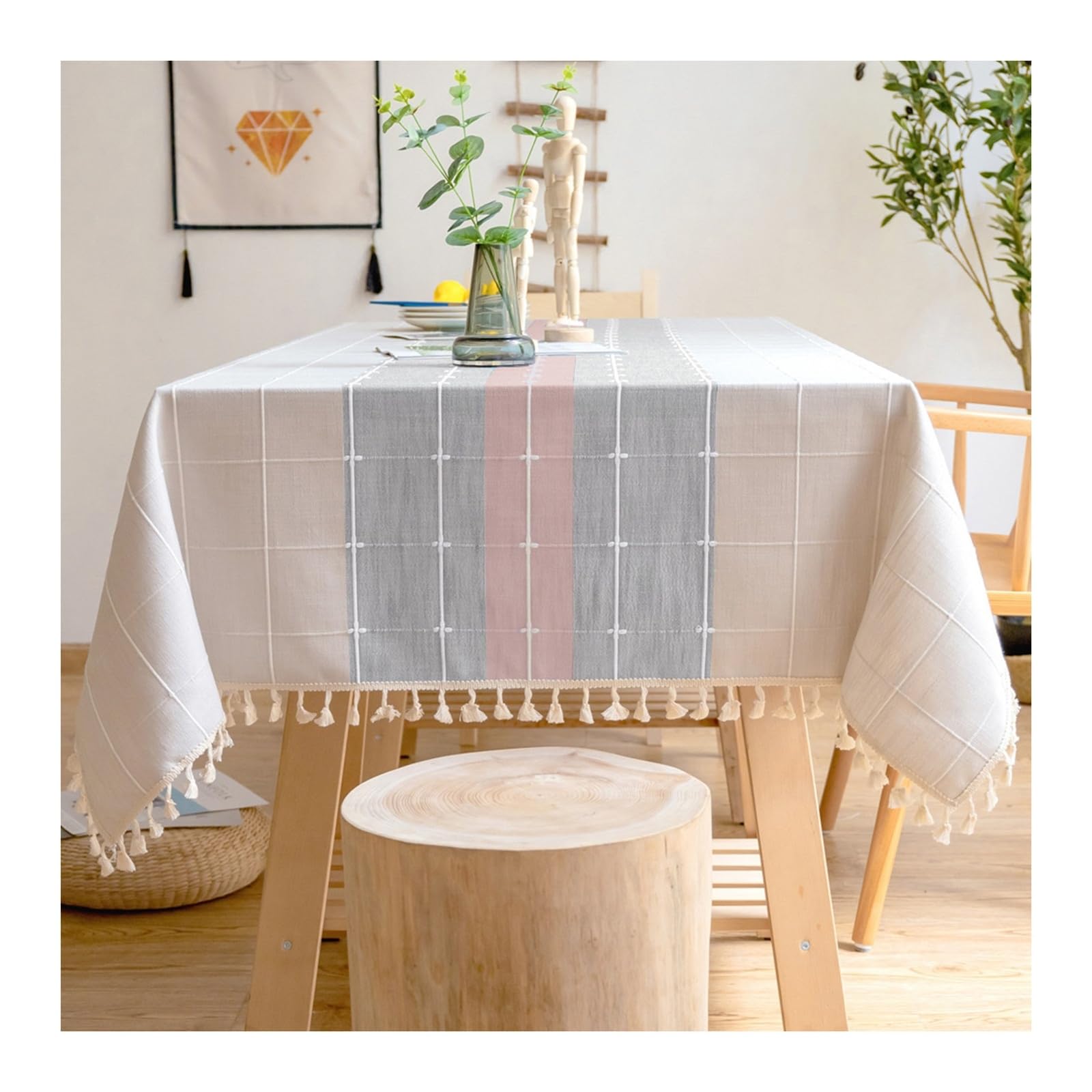 Nappe rose gris rayée anti-tache : protégez votre table sans masquer votre décoration