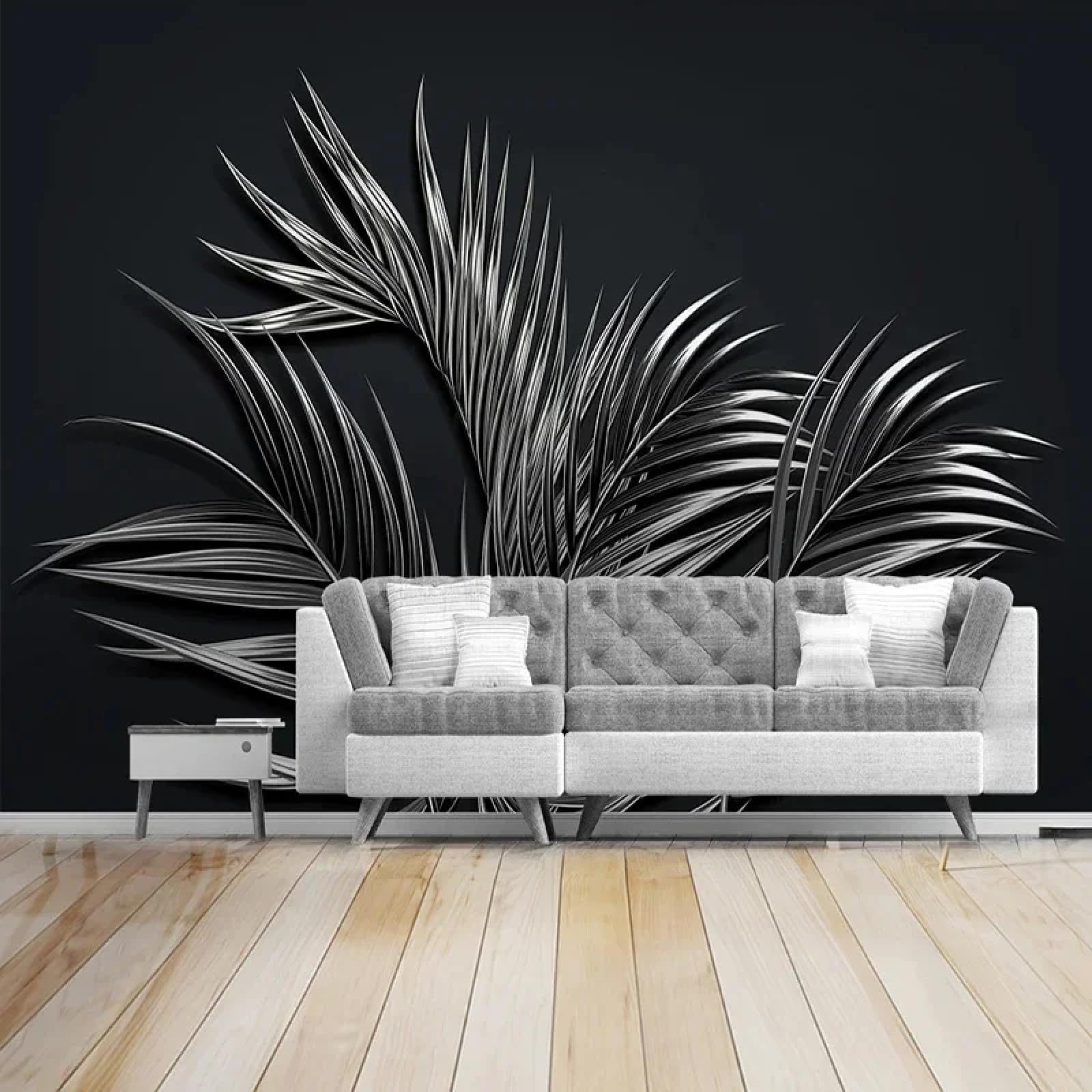 Papier peint tropical feuilles noires : créez une ambiance cosy derrière votre canapé