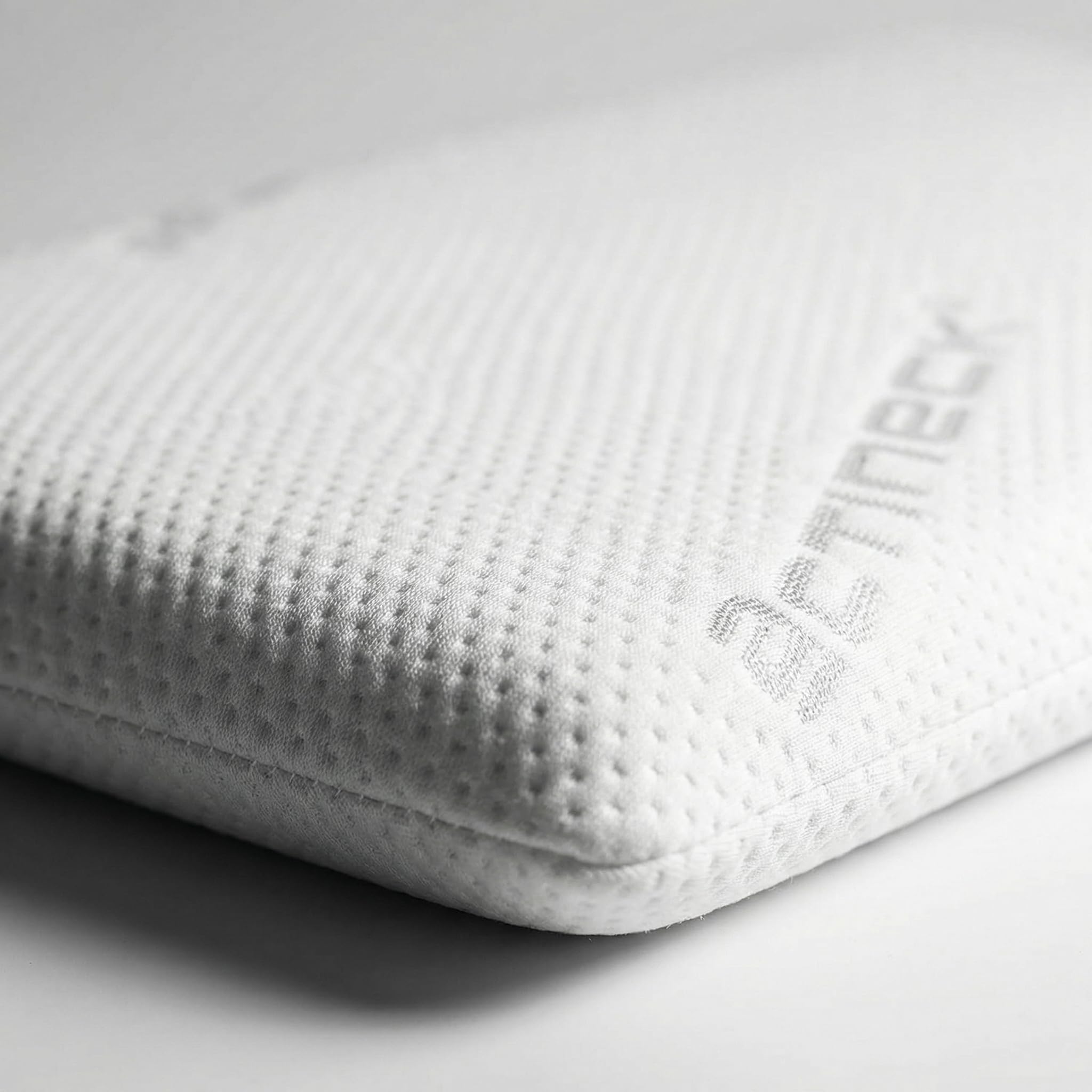 ACTINECK Almohada Bebé Baby 55x30x3cm - Transpirable, Hipoalergénica y Antiescaras - Funda Lavable e Hidrófuga - Fabricada en España para Recién Nacidos