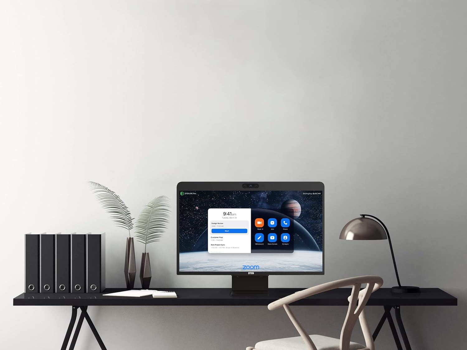 DTEN Me Pro 27 on a desk with office accessories