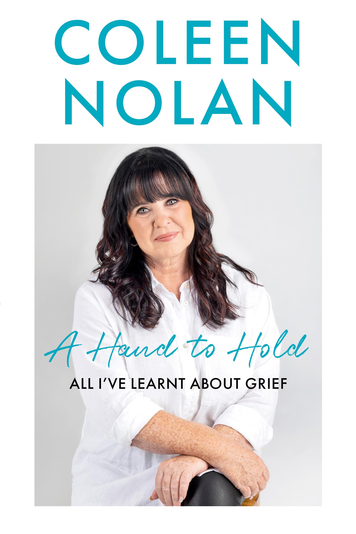 A Hand to Hold: The Sunday Times Top Ten Bestseller. A compassionate and supportive memoir on coming to terms with loss from Loose Women’s Coleen Nolan