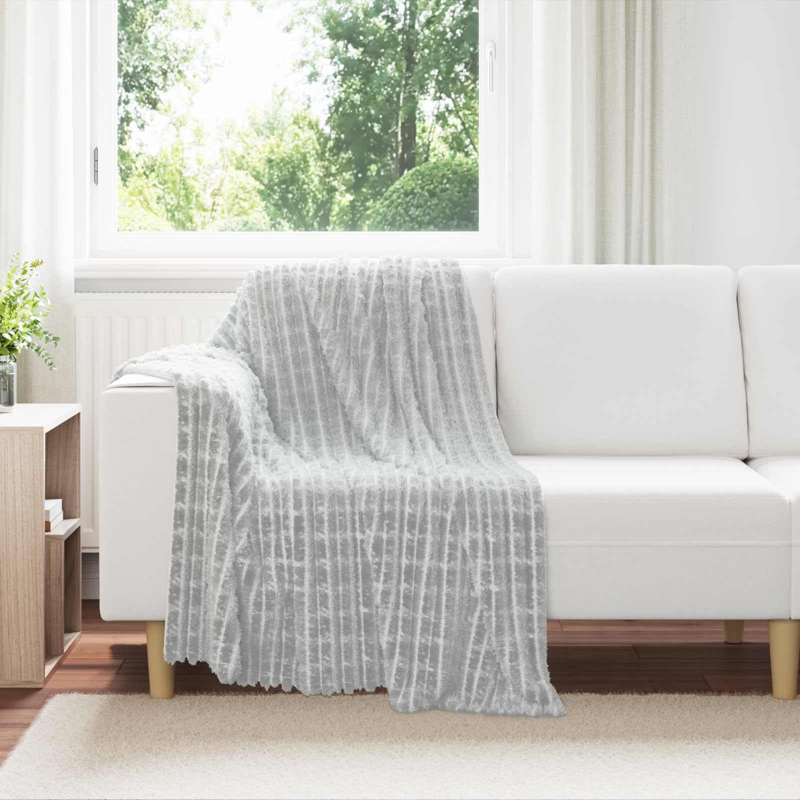 Couverture grise en polaire de qualité supérieure plaid doux finitions soignées lit et canapé