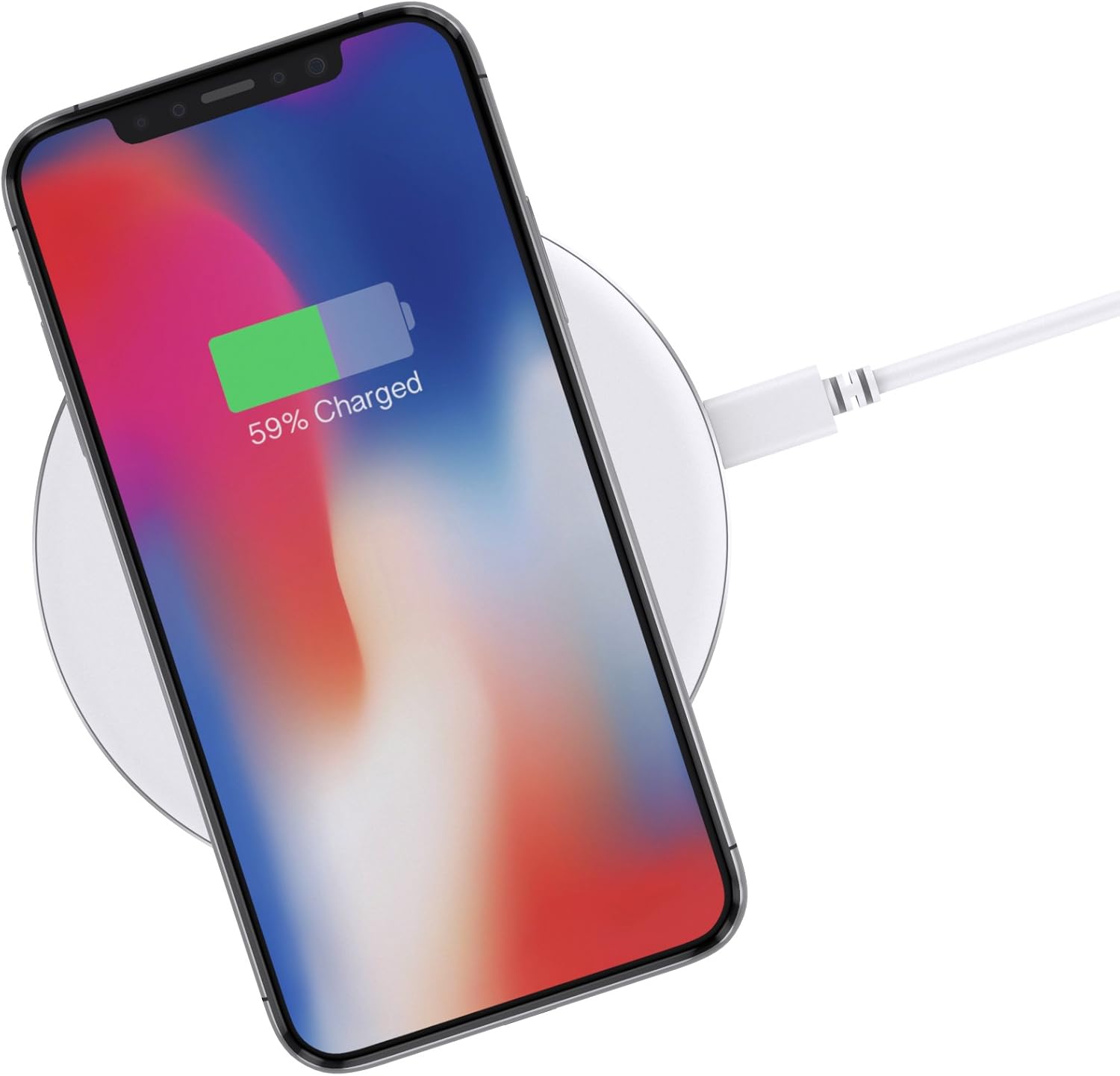 iPhone X placed on the wireless charging pad, showing 59% charge