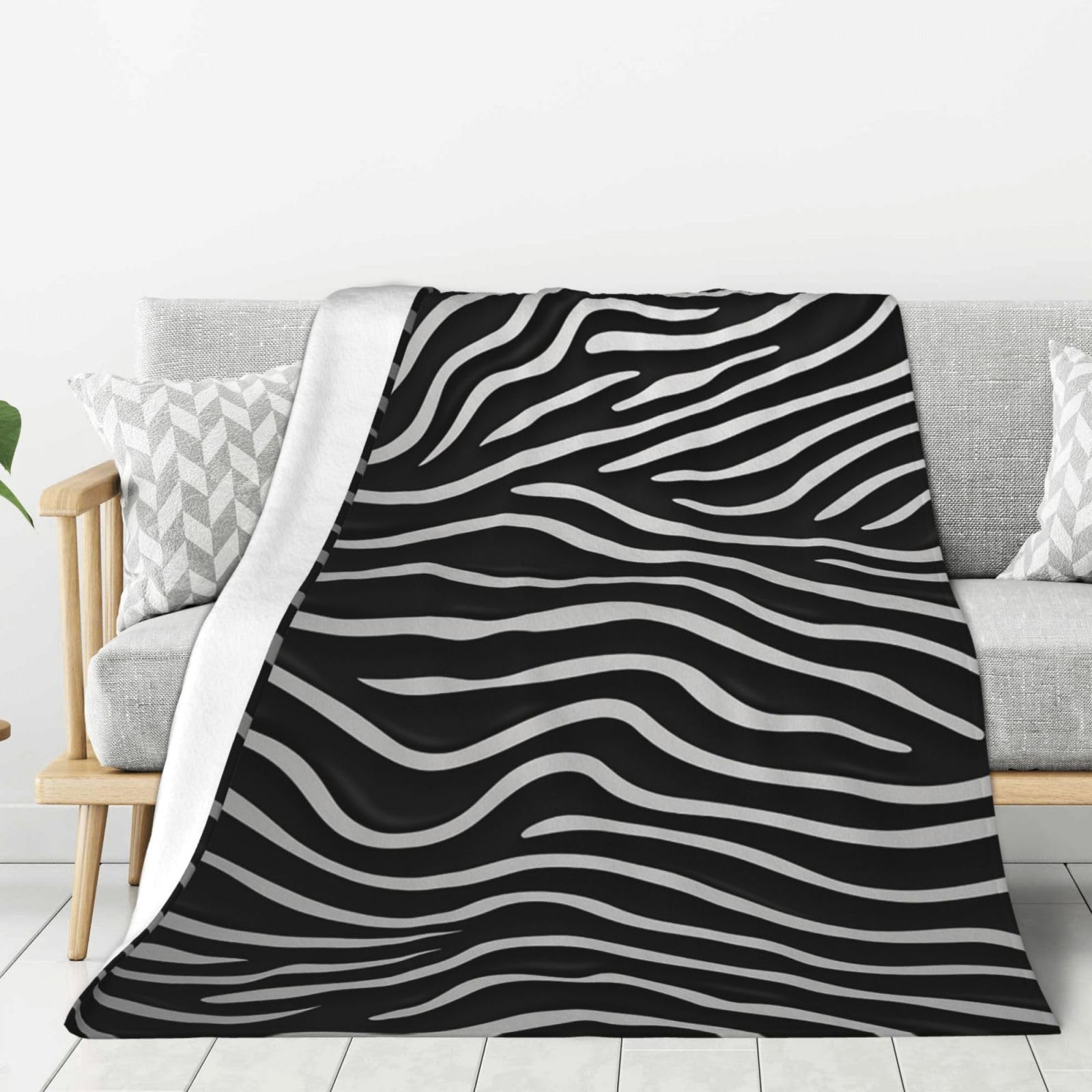 Couverture polaire en flanelle légère contre le froid sur le lit et canapé