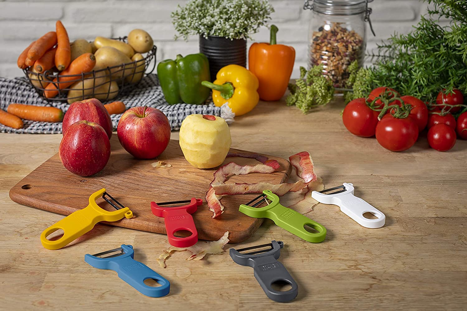 KUHN RIKON 24286 Swiss Peeler zestaw 2-częściowy, obieraczka do warzyw, ostrze ze stali nierdzewnej, czerwony i zielony, plastikowy