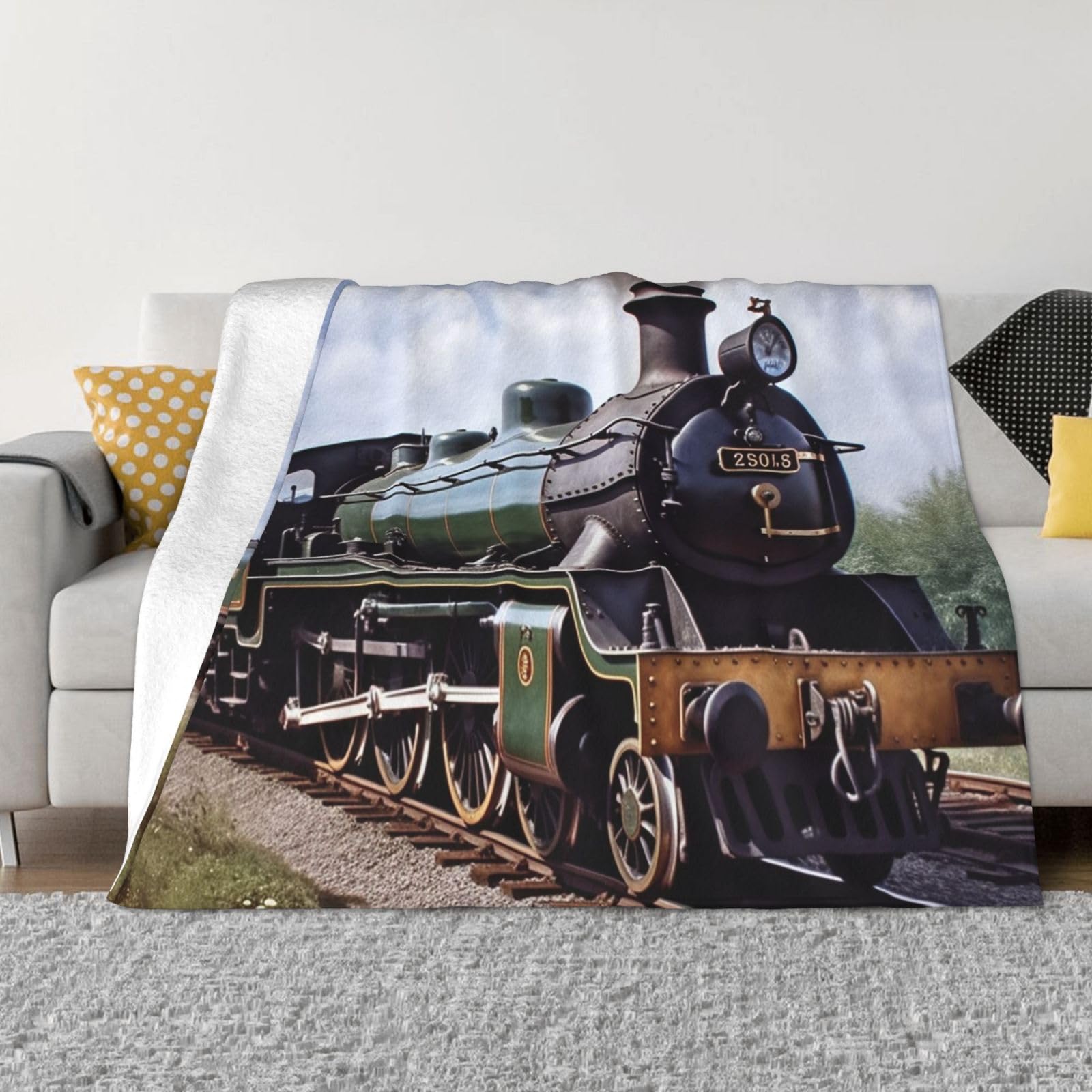 Couverture train pour des soirées cocooning confortables sur le canapé