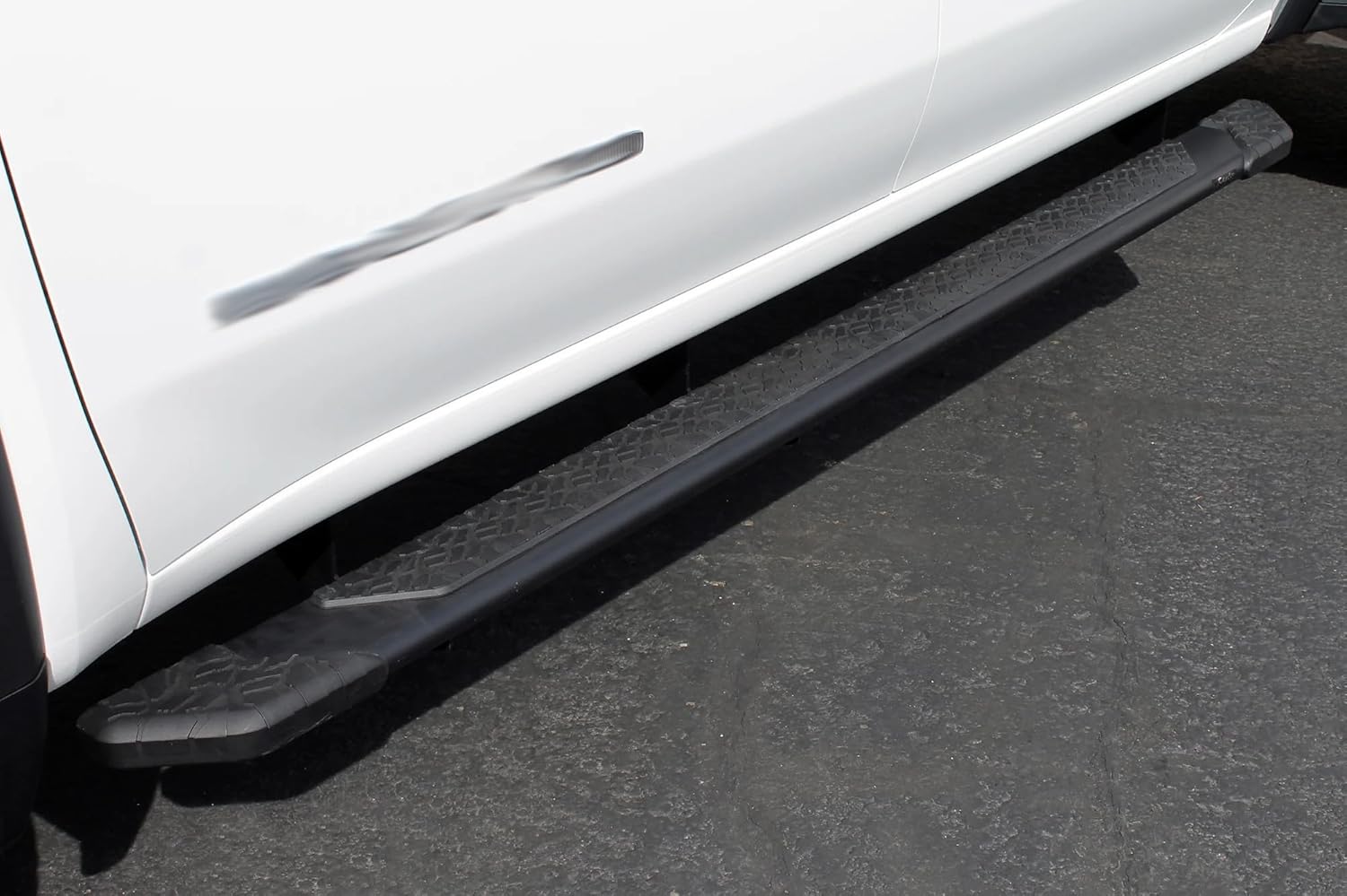 Close-up of Raptor Series running board installed on a white truck