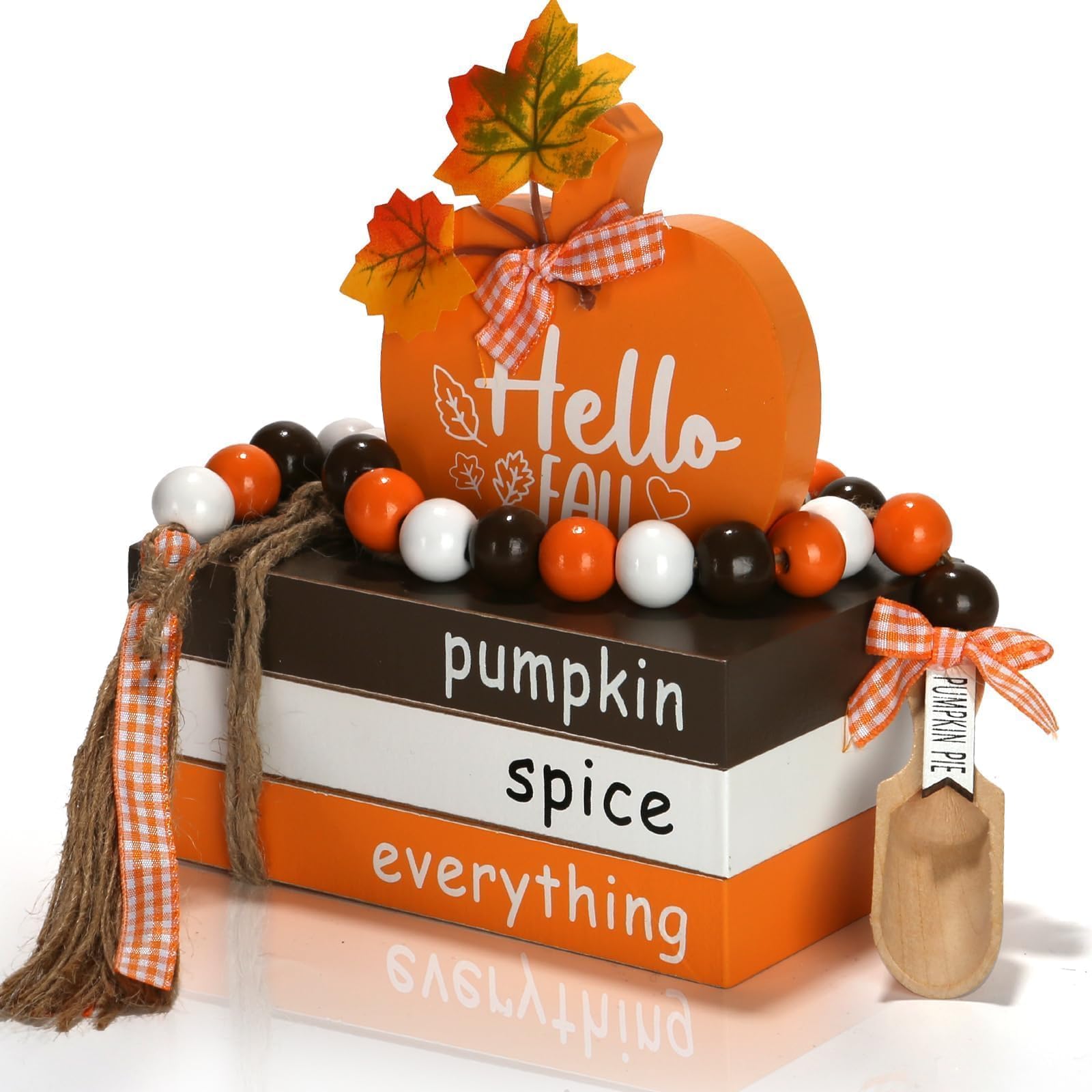 Fall faux book stack with a wood pumpkin sign and bead garland
