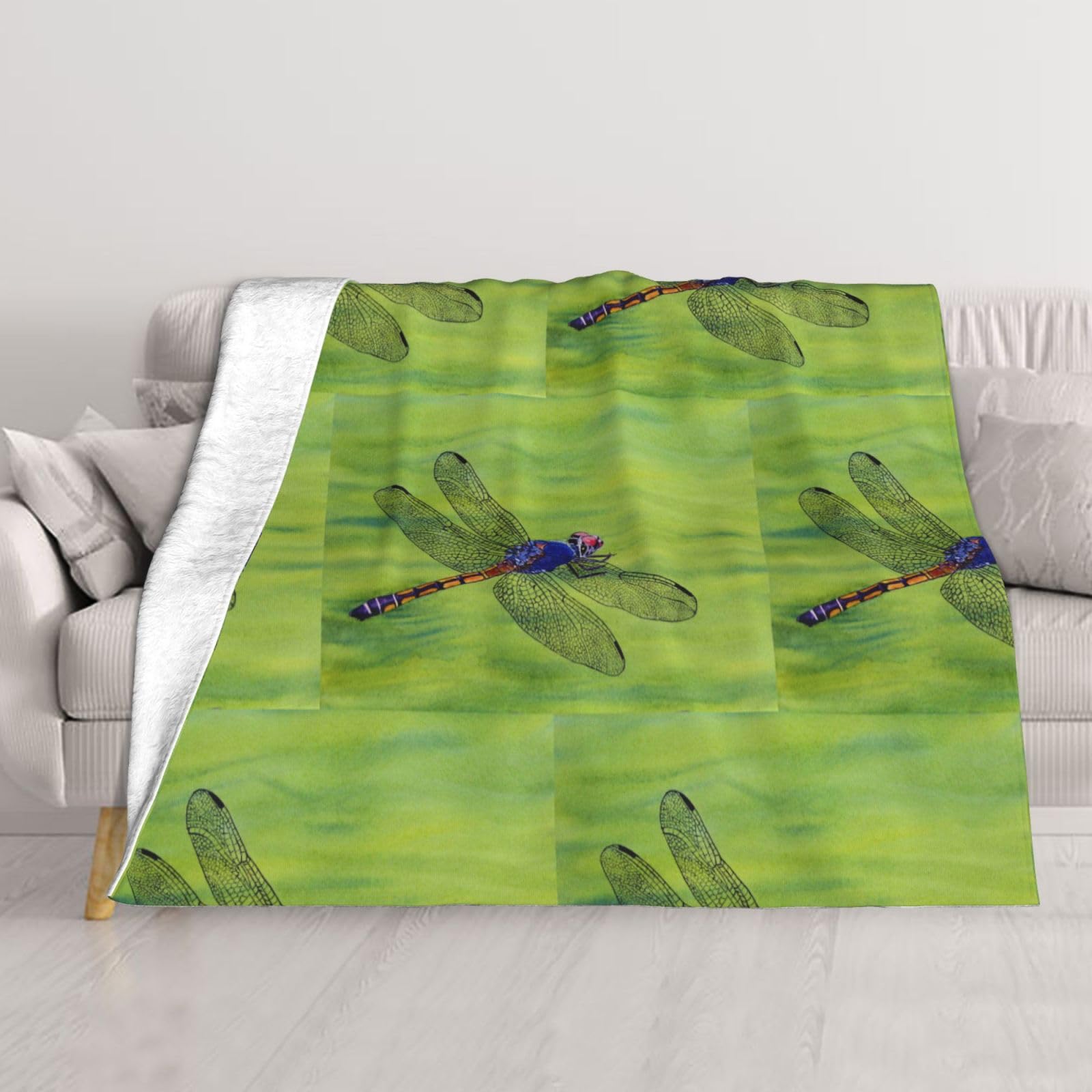 Couverture libellule bleue pour cocooning intense sur votre canapé
