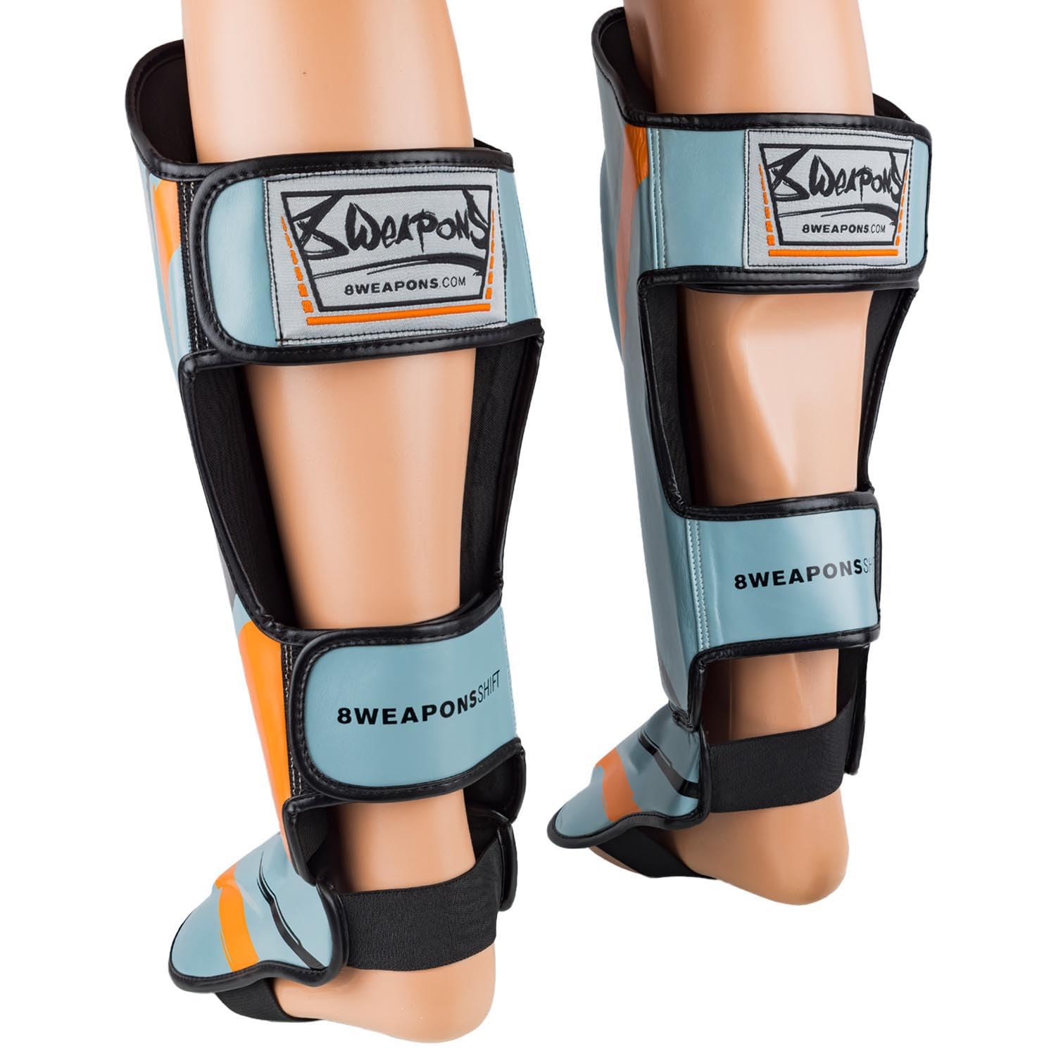 8 WEAPONS Espinilleras Shift, color gris hielo naranja, entrenamiento y competición, piel sintética de alta calidad y amortiguación perfecta, Muay Thai, K1, MMA, karate y kickboxing