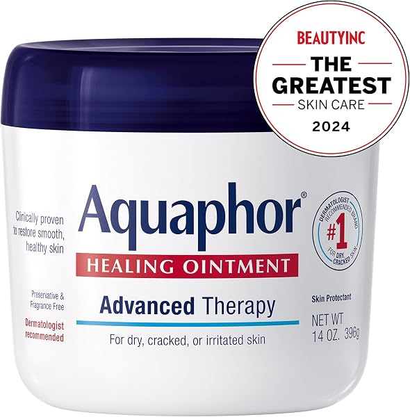 A close-up of the Aquaphor Healing Ointment jar, showing its thick, translucent ointment texture.