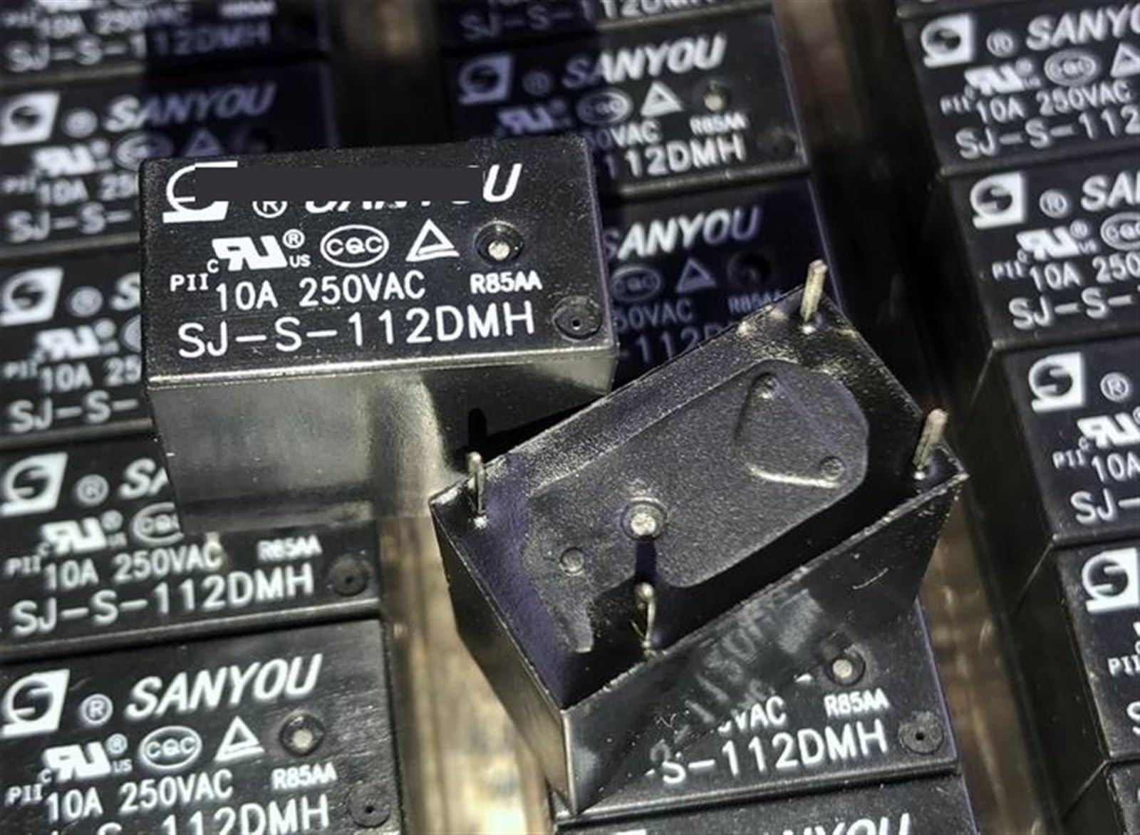 Relé de 4 pines SJ-S-112DMH con conmutación eficiente de 12V y alta capacidad 2