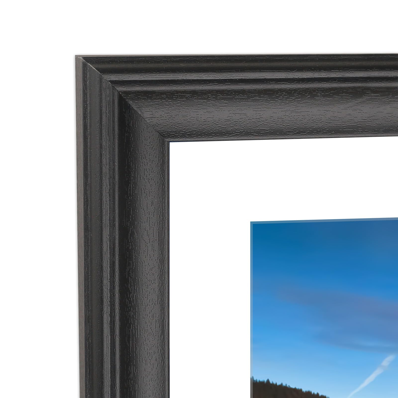 Cadre photo en bois noir pour sublimer un puzzle de salon