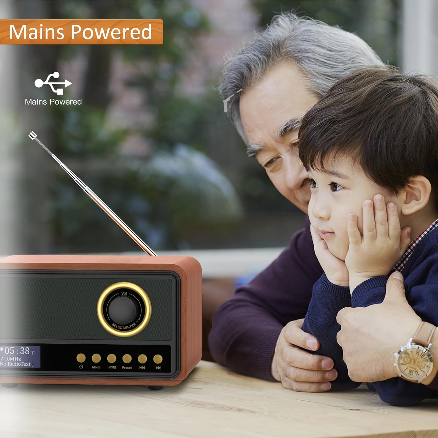 Mycket Digital DAB/DAB+ Radio being used while connected to mains power, with an older man and child observing.