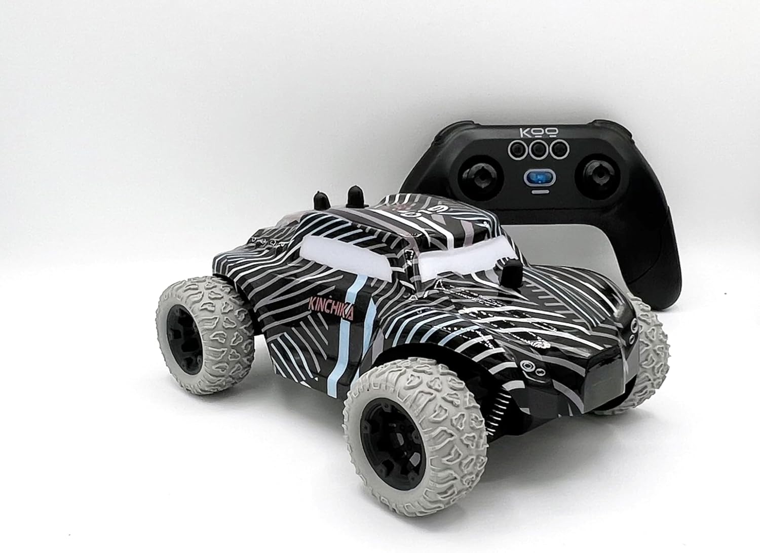 KOO Be Blip Kinchika RC car and its remote control side by side