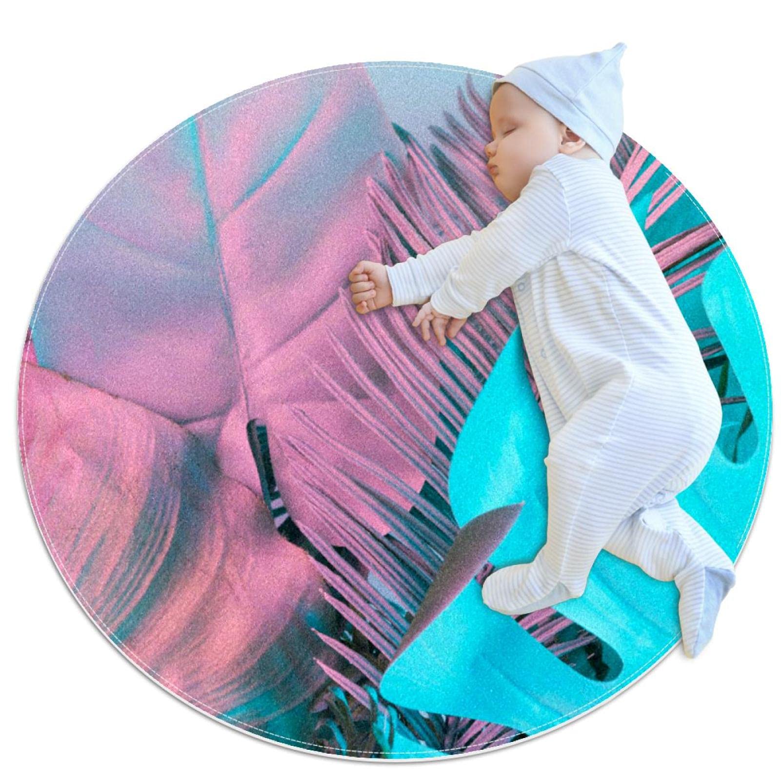 Tapis de salle de bain rond design tropical bleu et rose aux finitions soignées