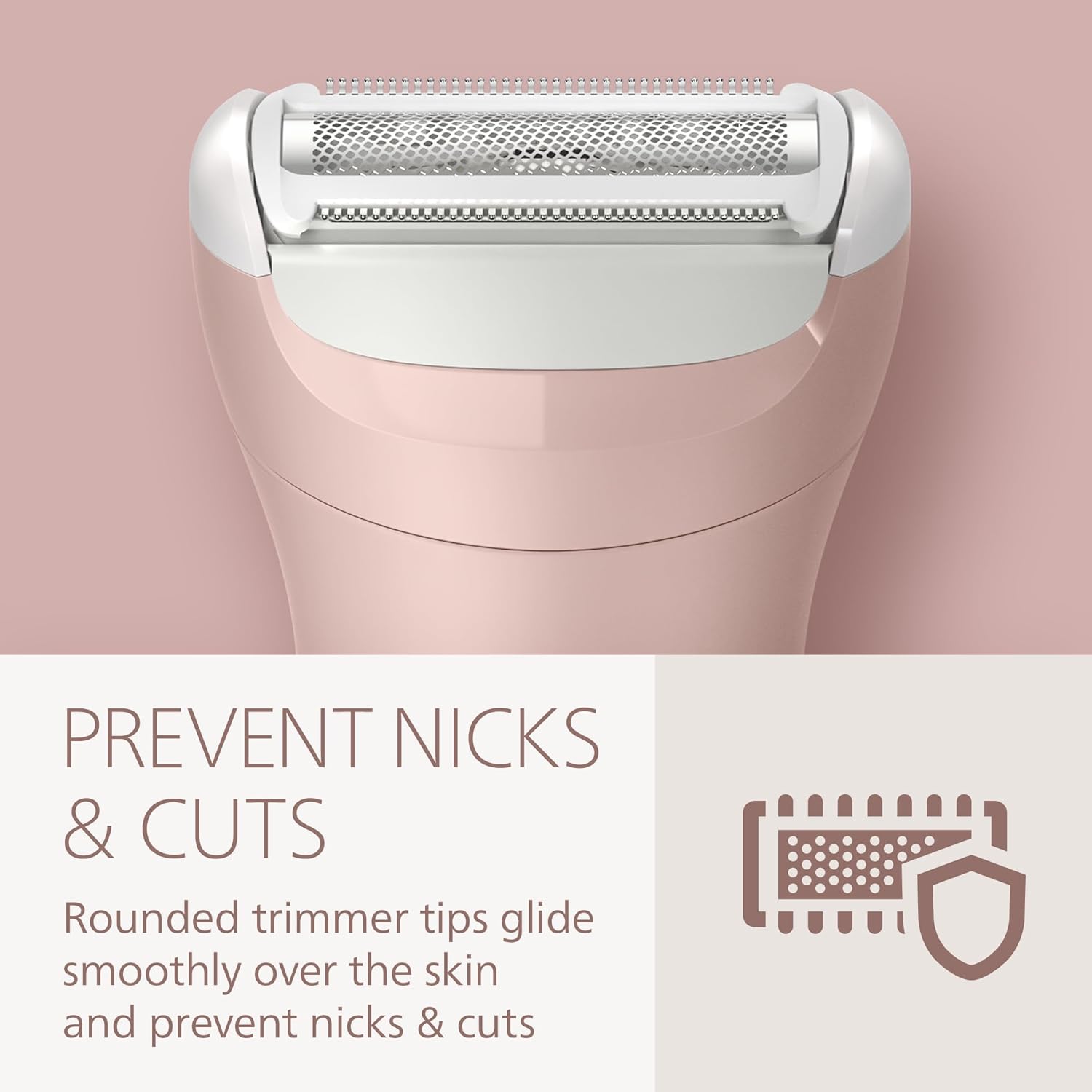 Close-up of the Philips Lady Shaver head, highlighting rounded trimmer tips for preventing nicks and cuts.