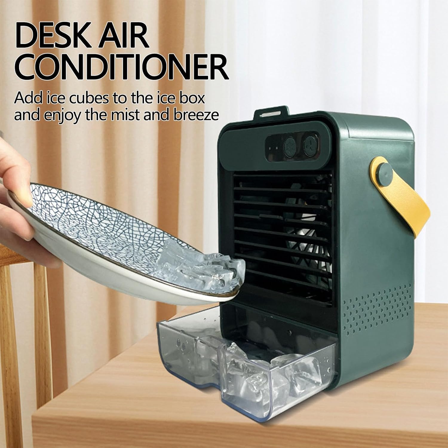 Hand adding ice cubes to the ice box of the portable air conditioner.