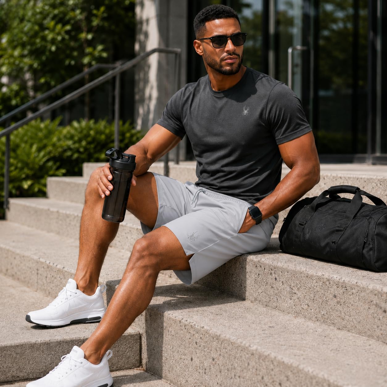 Spyder Pantalones cortos deportivos para hombre, ligeros, elásticos, con bolsillos para entrenamiento y correr, entrepierna de 8 pulgadas