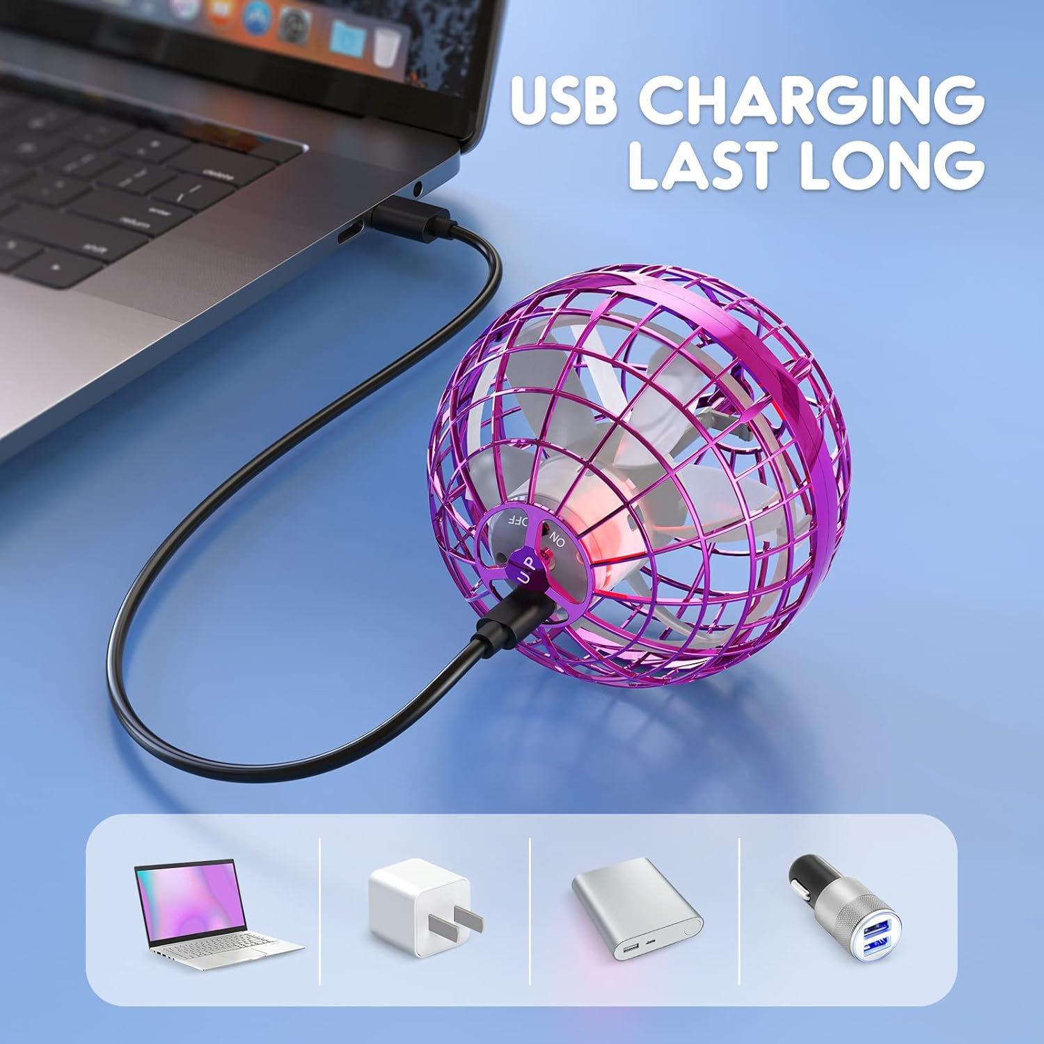 TOMZON A32 Flying Orb Ball connected to a laptop via USB for charging