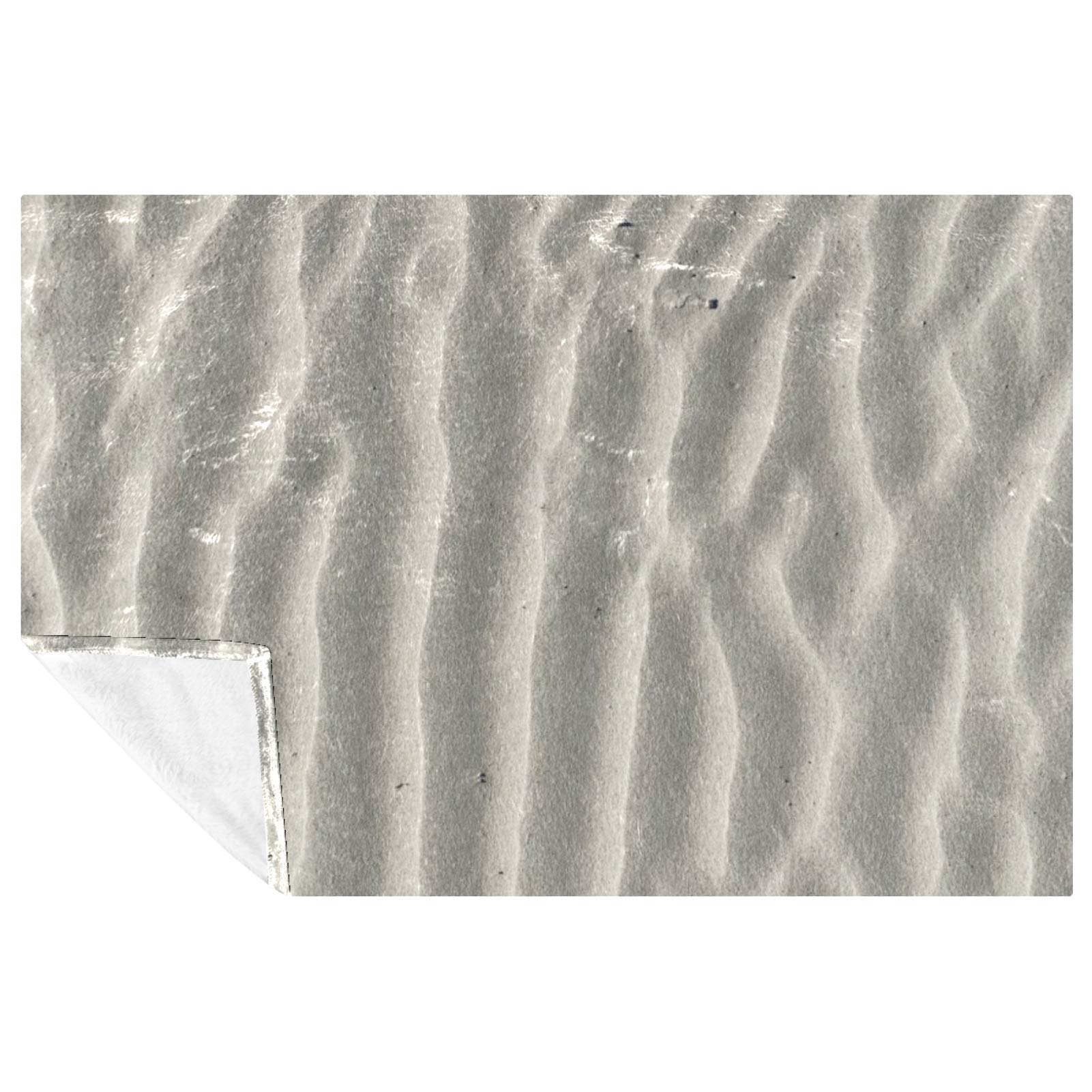 Couverture douce sable 150x100 cm idéale pour vos soirées cocooning sur le canapé