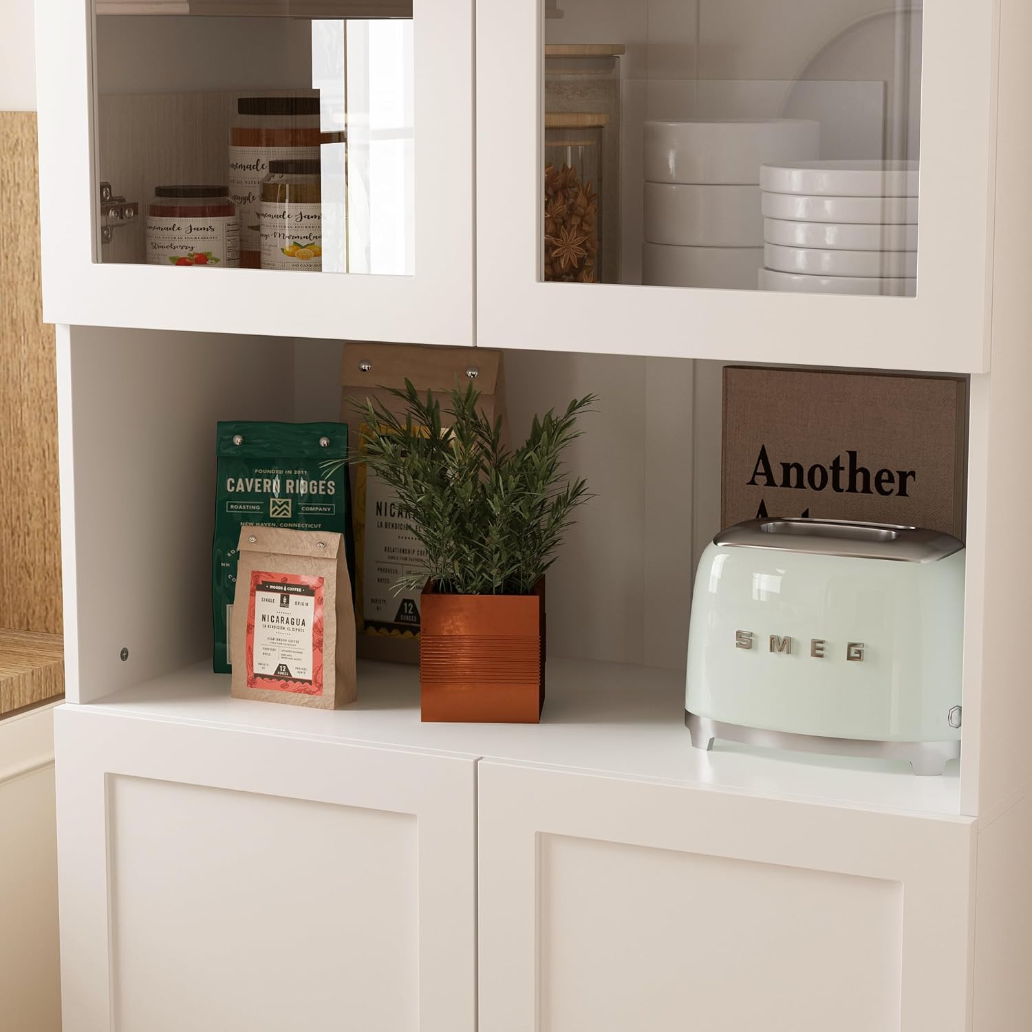 Close-up view of the central open countertop of the Homsee Kitchen Pantry, featuring a toaster and decorative items.