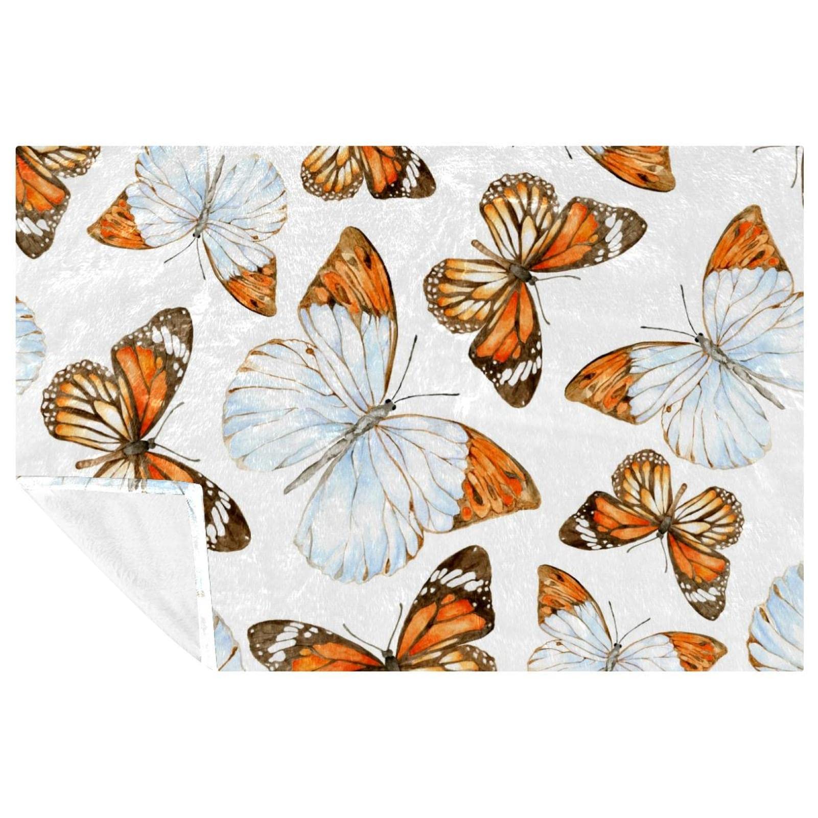 Couverture chaude papillon aquarelle pour stopper le froid sur le canapé