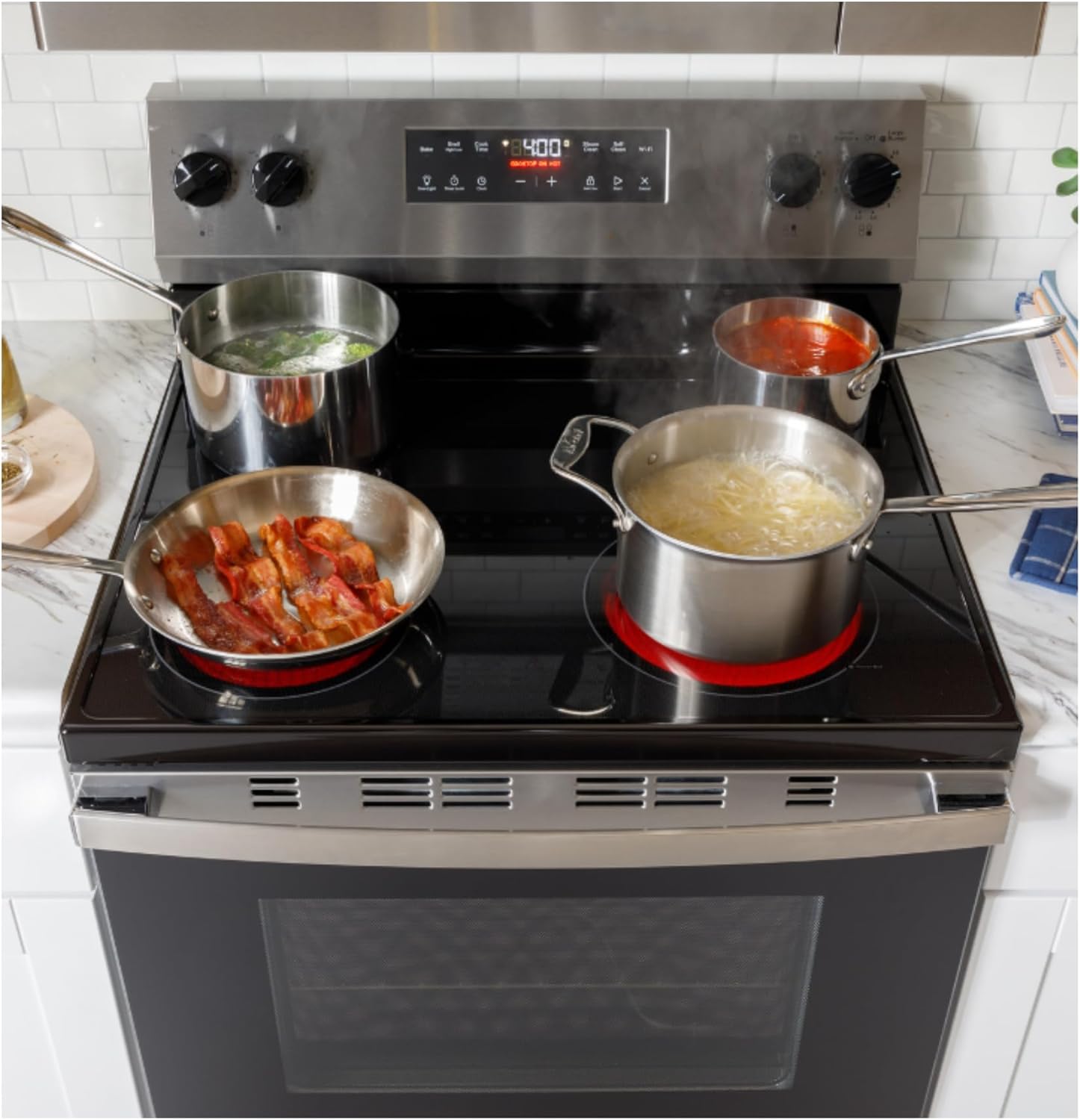 GE Freestanding Electric Range with Steam Cleaning & 4 Burner Radiant Cooktop - 5.3 Cu. Ft.