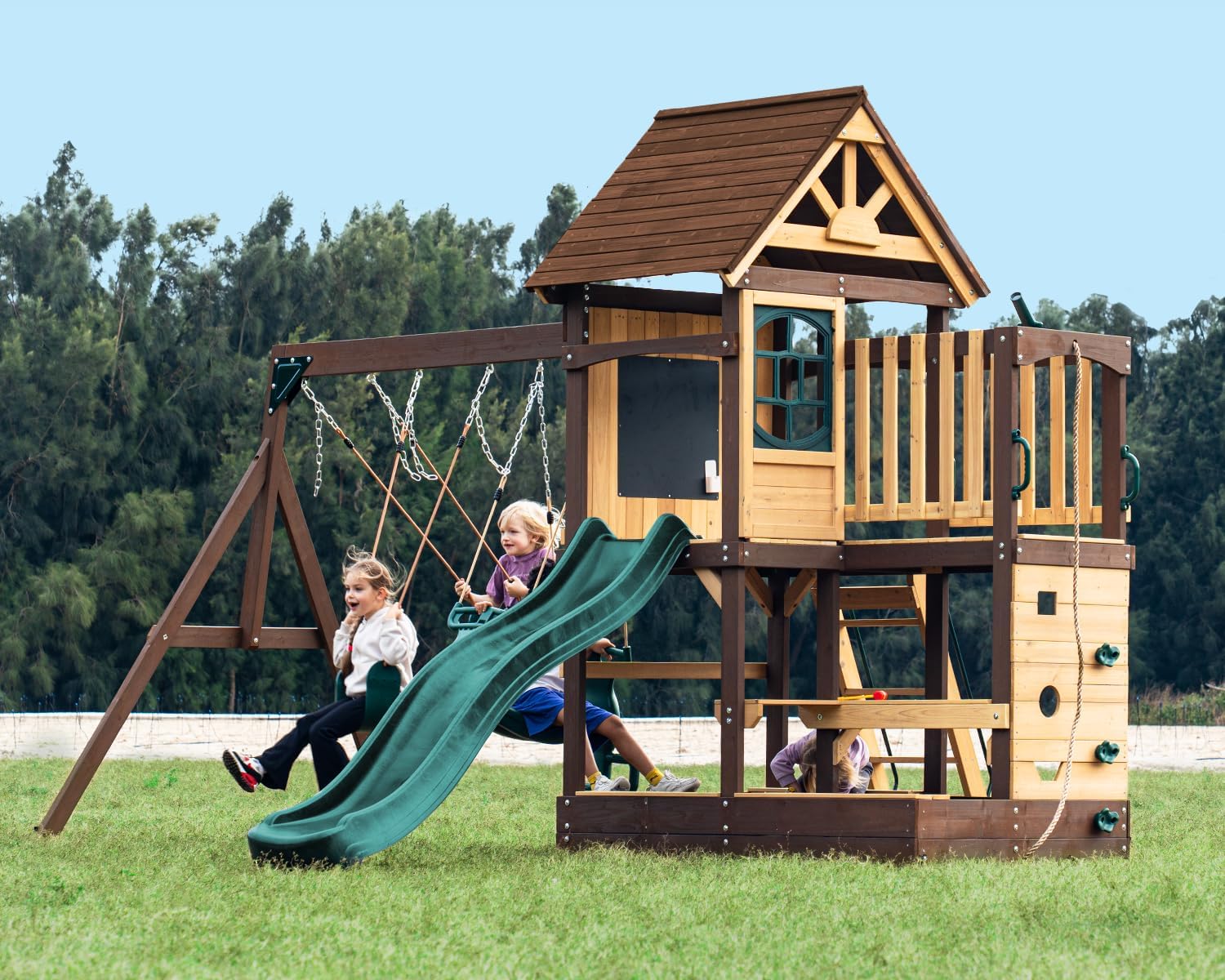 Dolphin Playground Wooden Swing Set with Playhouse & Sandbox, Cedar Backyard Playset 6FT Wave Slide, Glider, 2 Swings, Outdoor Table, Large Climbing Wall & Chalkboard for Kids Ages 3-10 Includes