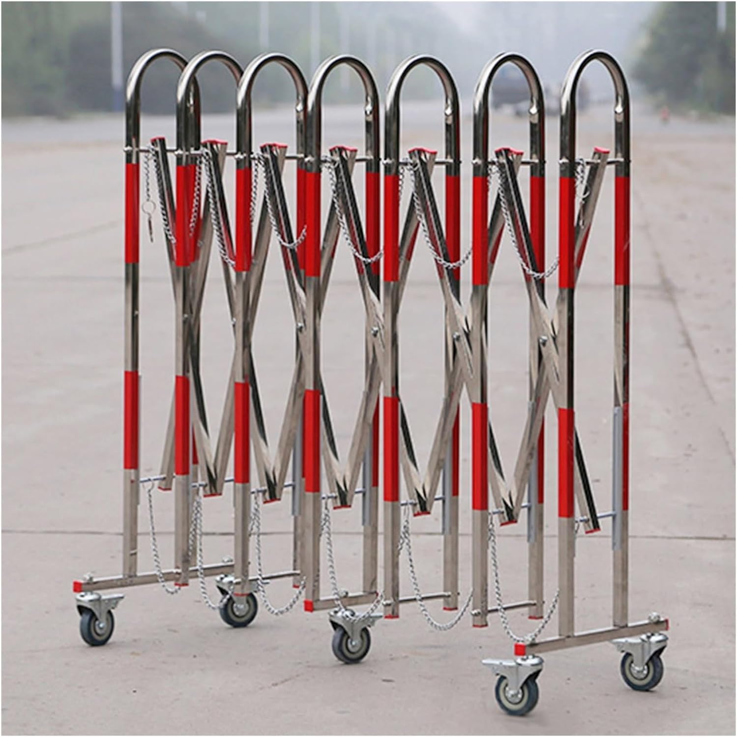 Barrière rétractable portable industrielle en acier pour sécuriser garage et zone de chantier