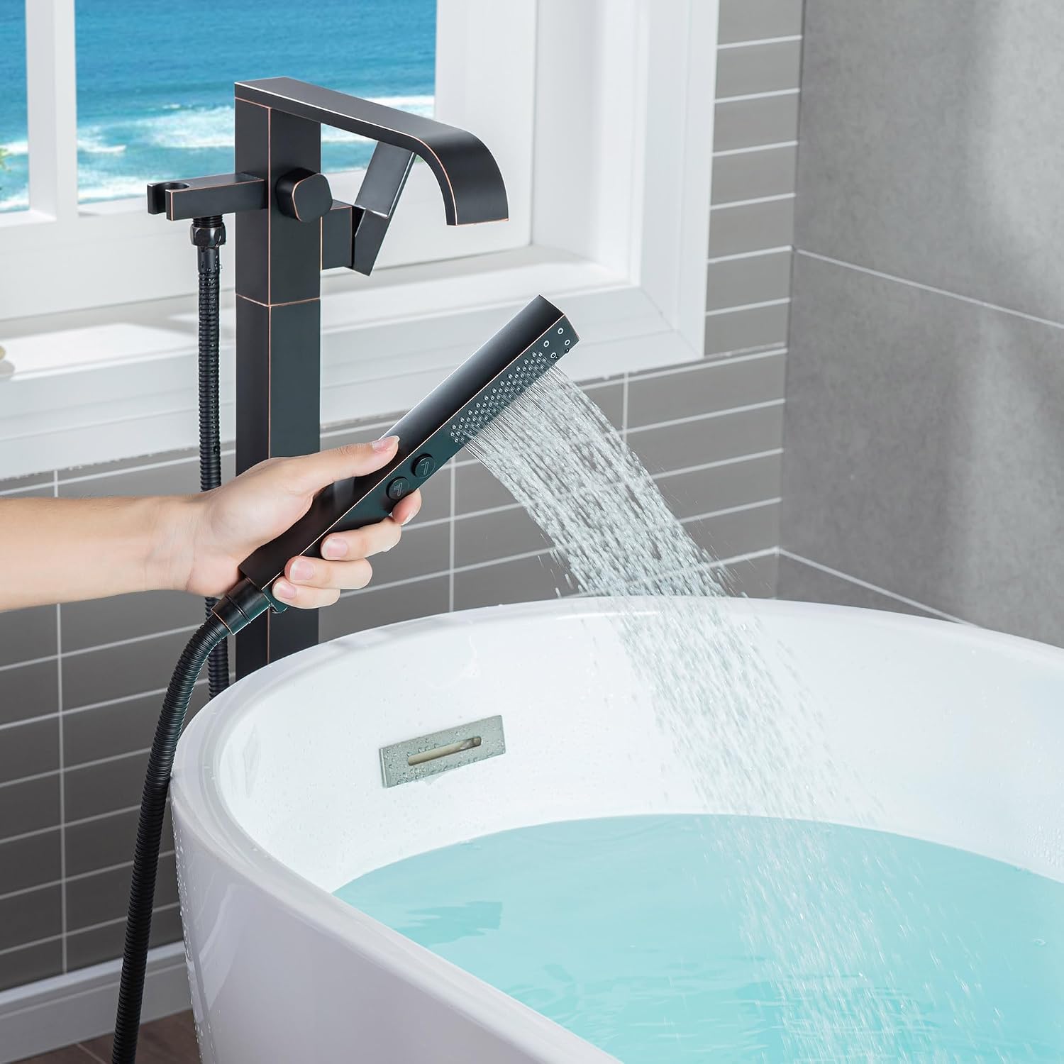 WOODBRIDGE F0038ORB Contemporary Single Handle Floor Mount Freestanding Tub Filler Faucet with Hand shower in Oil-Rubbed Bronze Finish