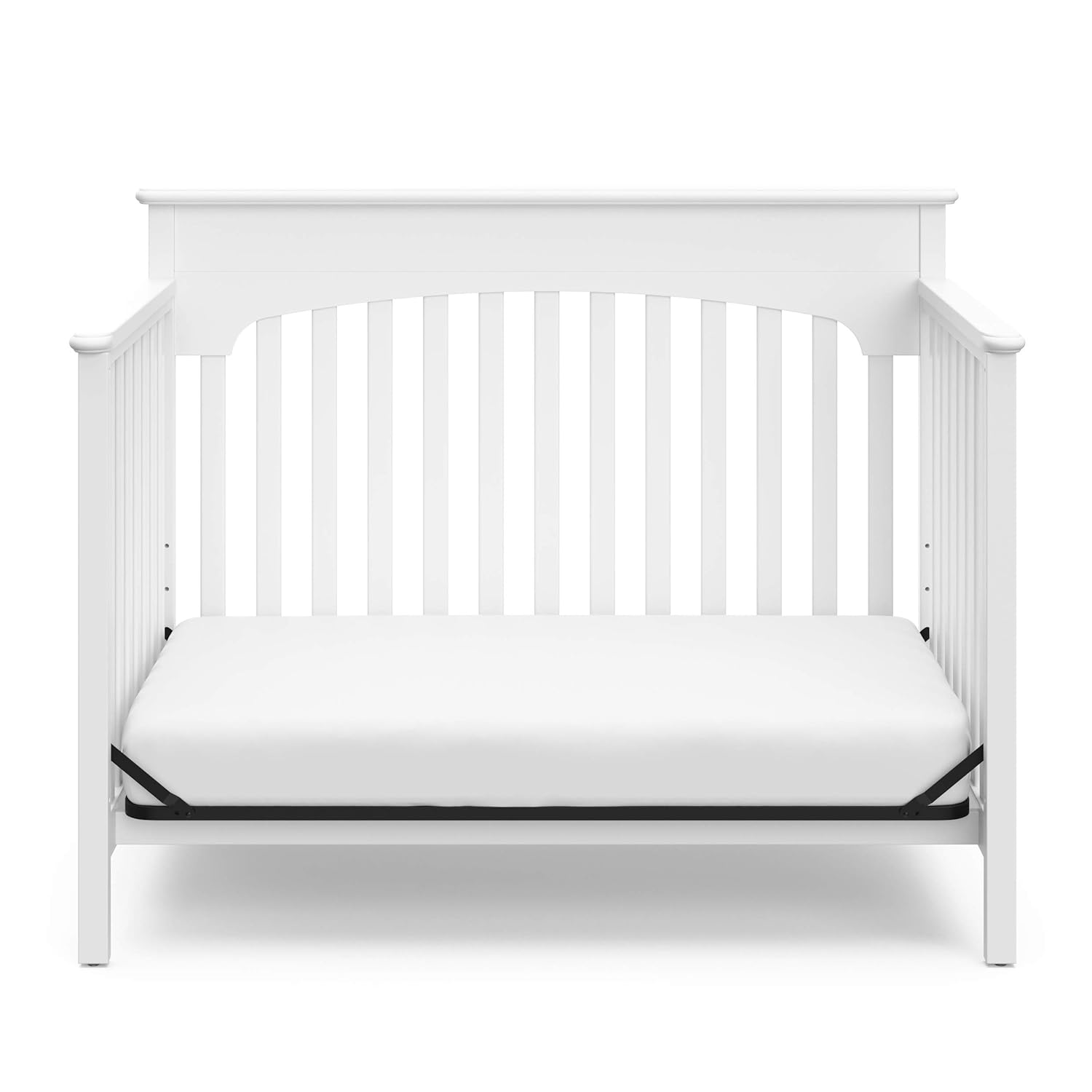 Graco Lauren crib converted to a toddler bed, with one side rail removed.