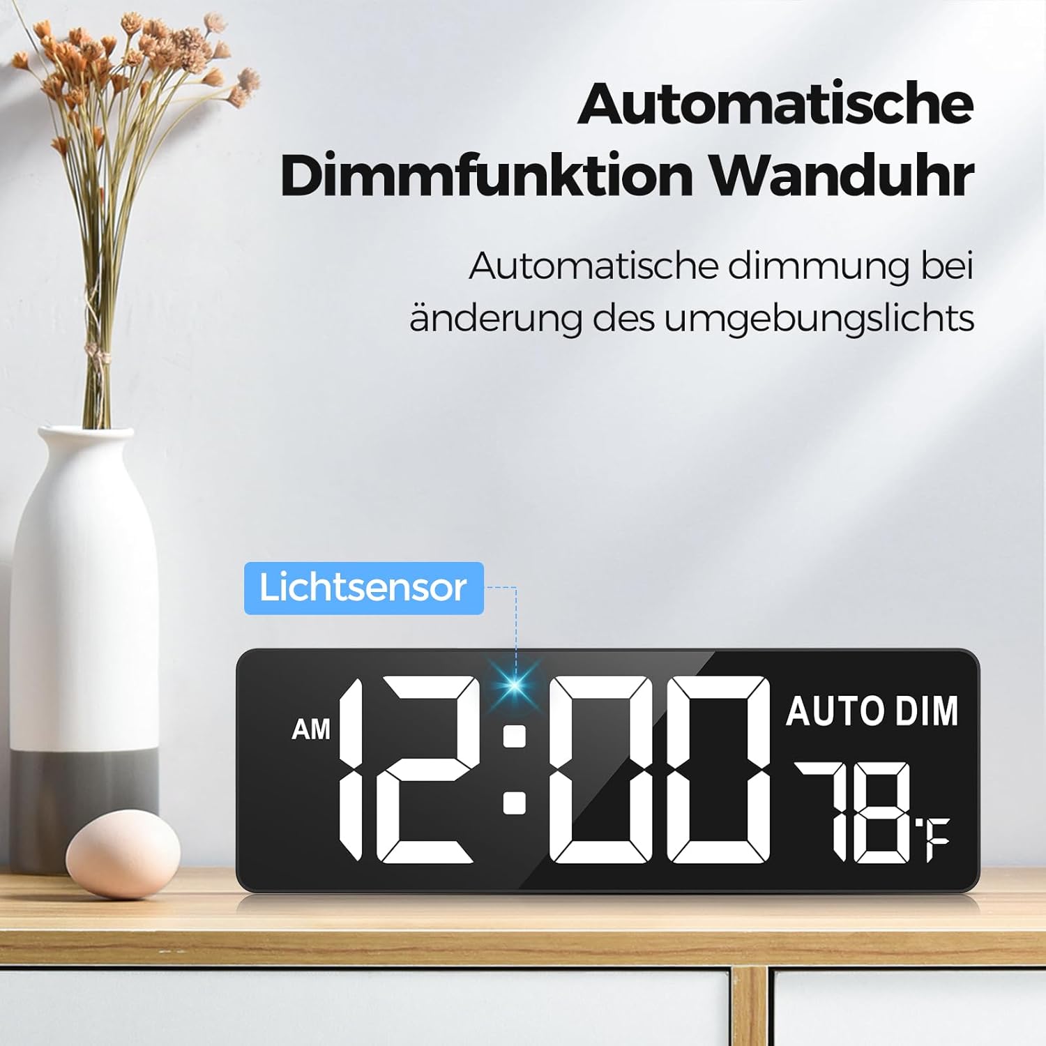 REACHER Digital LED Wall Clock on a shelf, demonstrating its automatic dimming function with a light sensor.