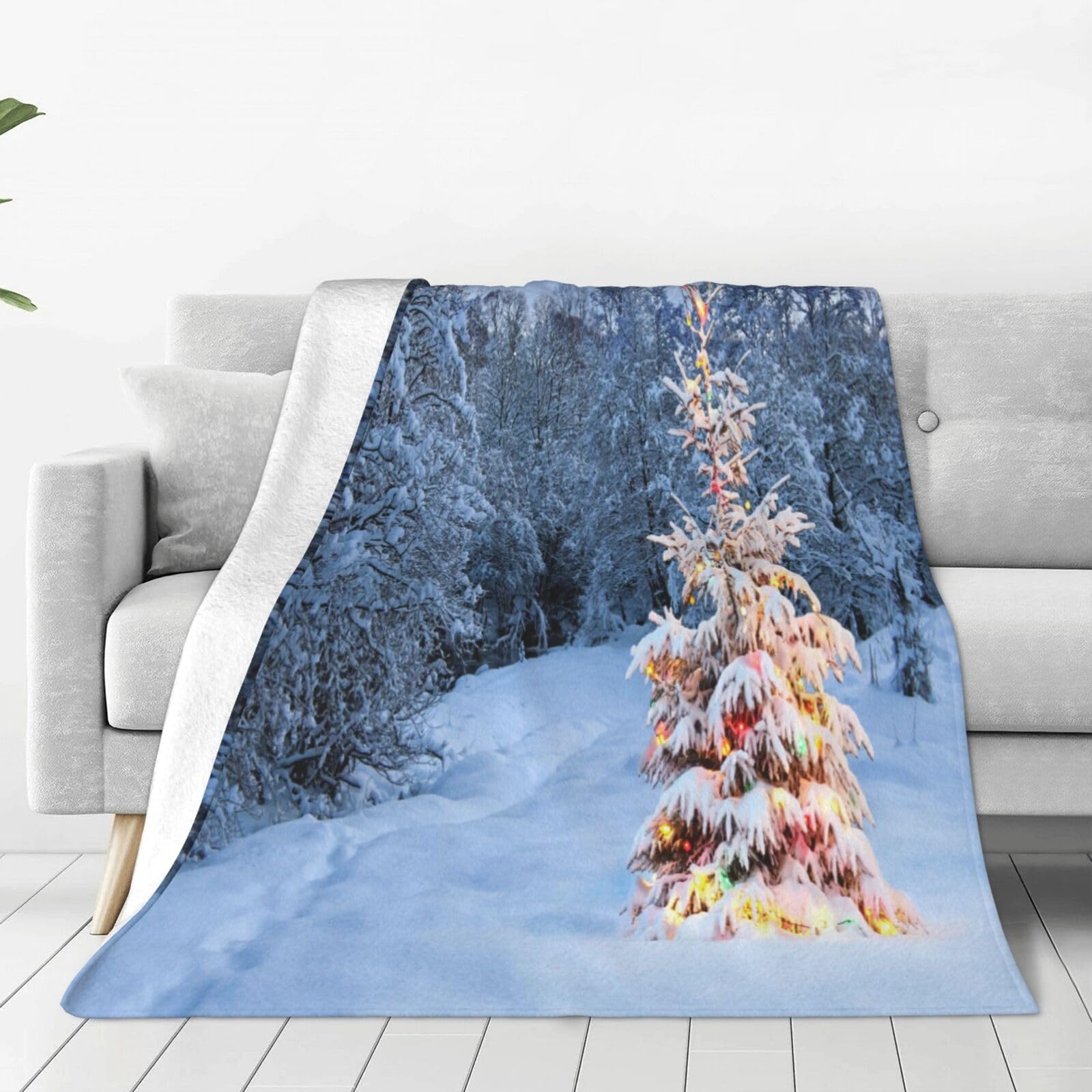 Couverture en polaire sapin de Noël pour partager la magie en famille