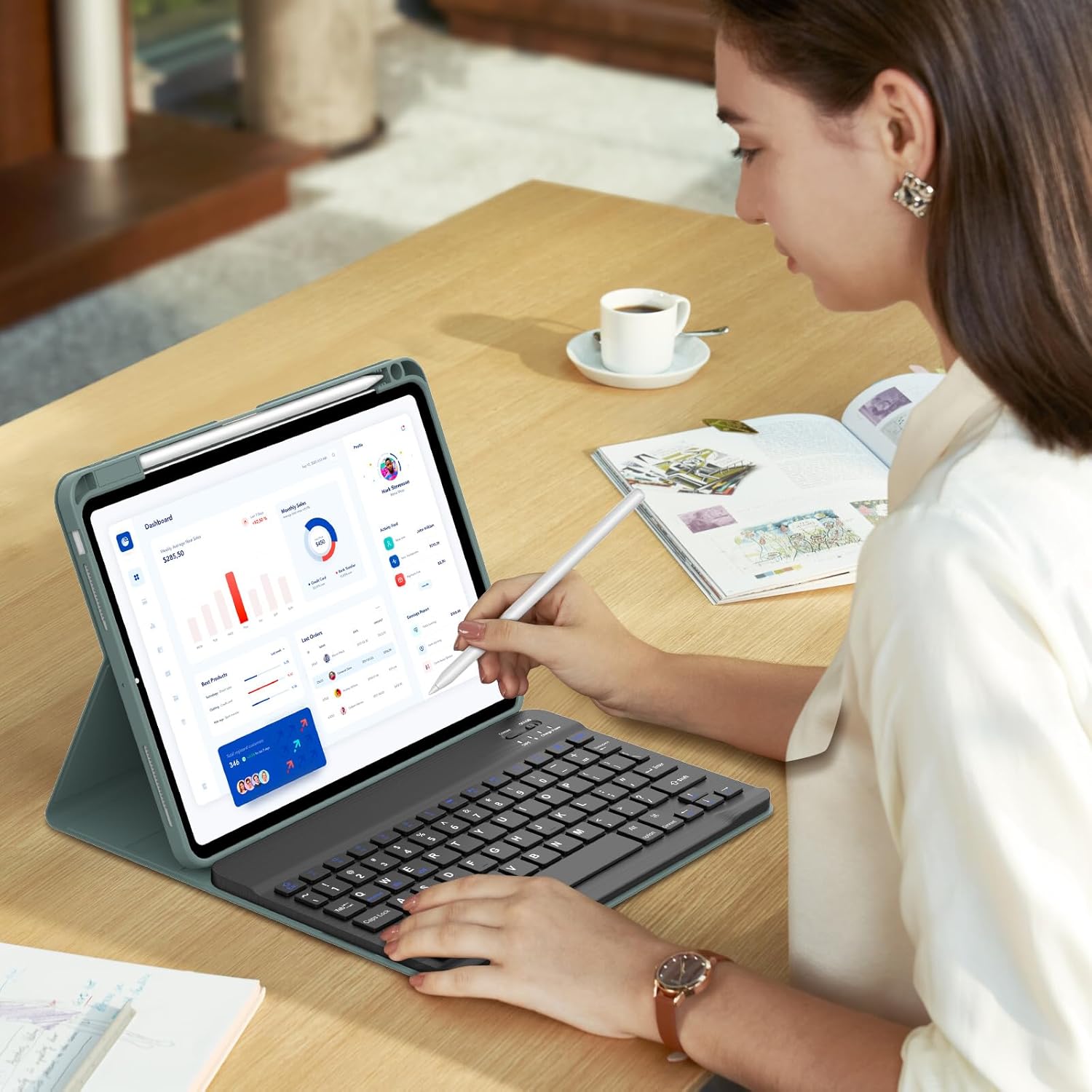 A person using the SENGBIRCH Keyboard Case with an iPad Pro 11-inch (M4) 2024, typing on the detachable keyboard and interacting with the screen using a stylus, demonstrating productivity.