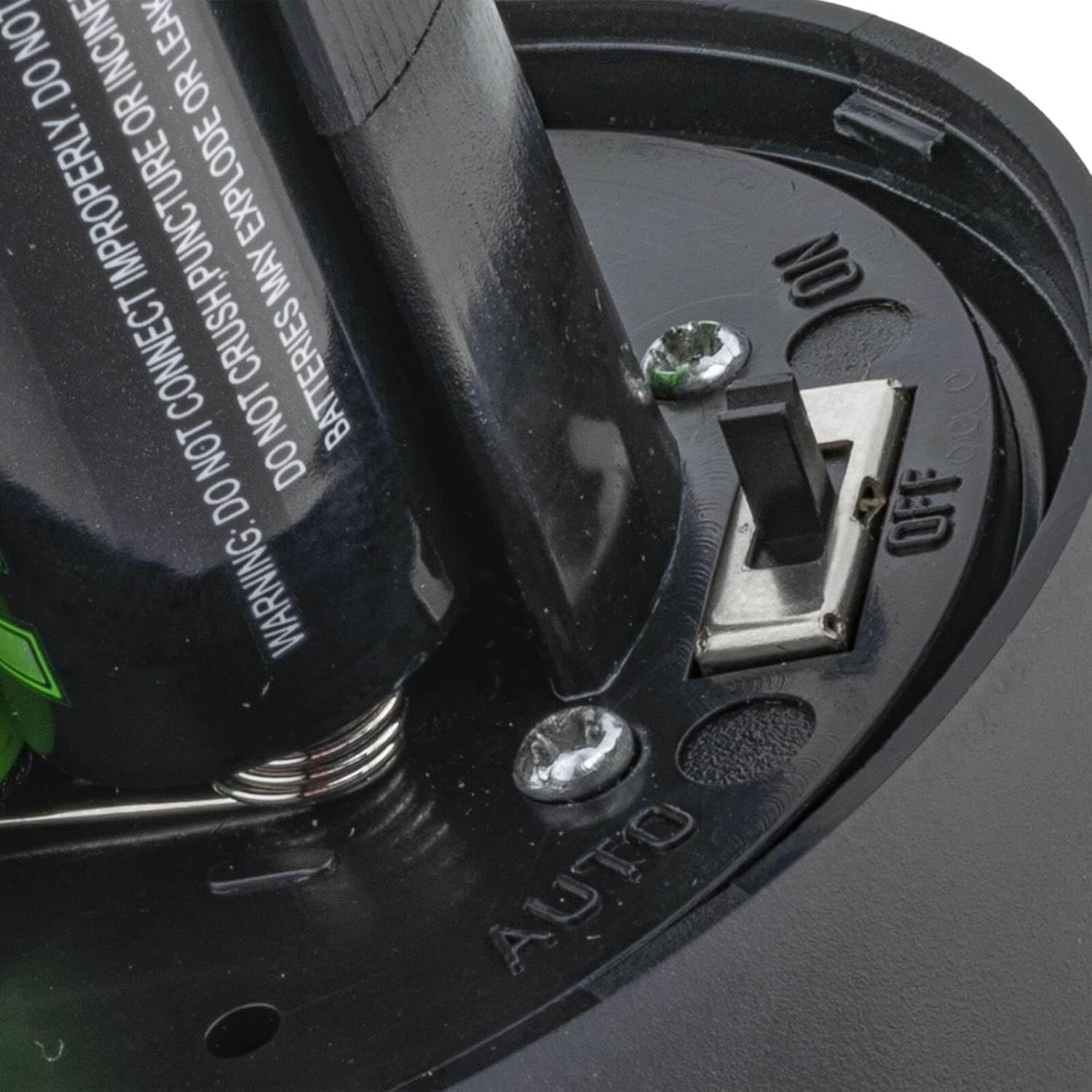 Close-up of battery compartment and ON/OFF/AUTO switch