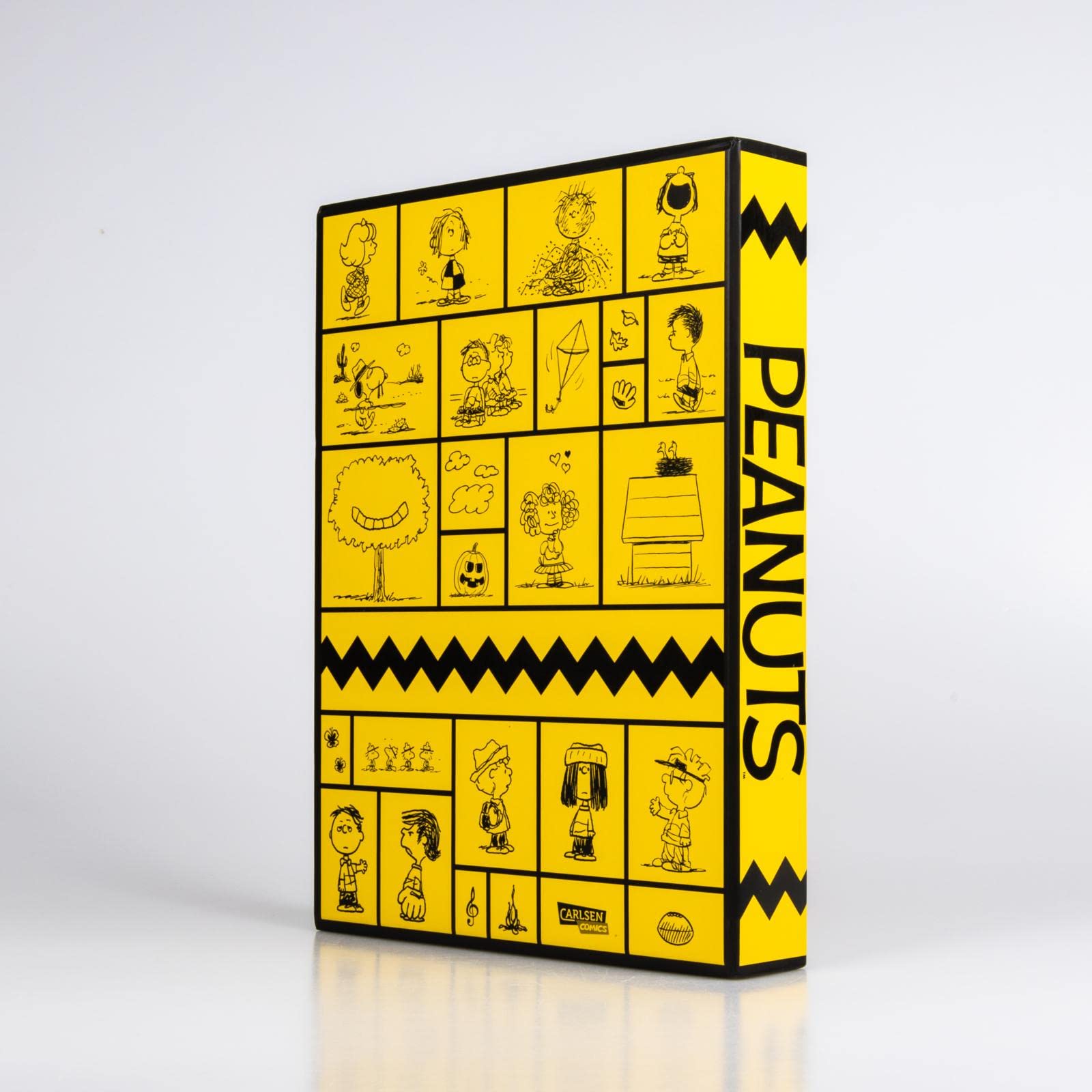 ... Und Charles M. Schulz schuf die Peanuts: Eine Hommage an den größten Comicstrip aller Zeiten | Hochwertige Luxusausgabe im Schuber (Peanuts Deluxe)