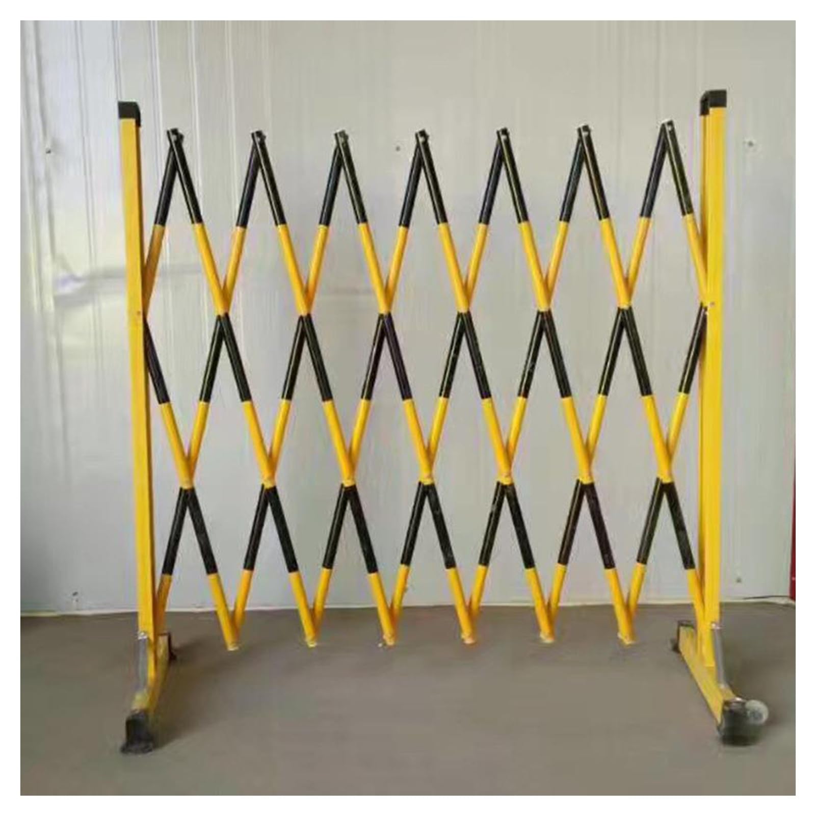 Barrière métallique réglable avec système accordéon jaune et noir