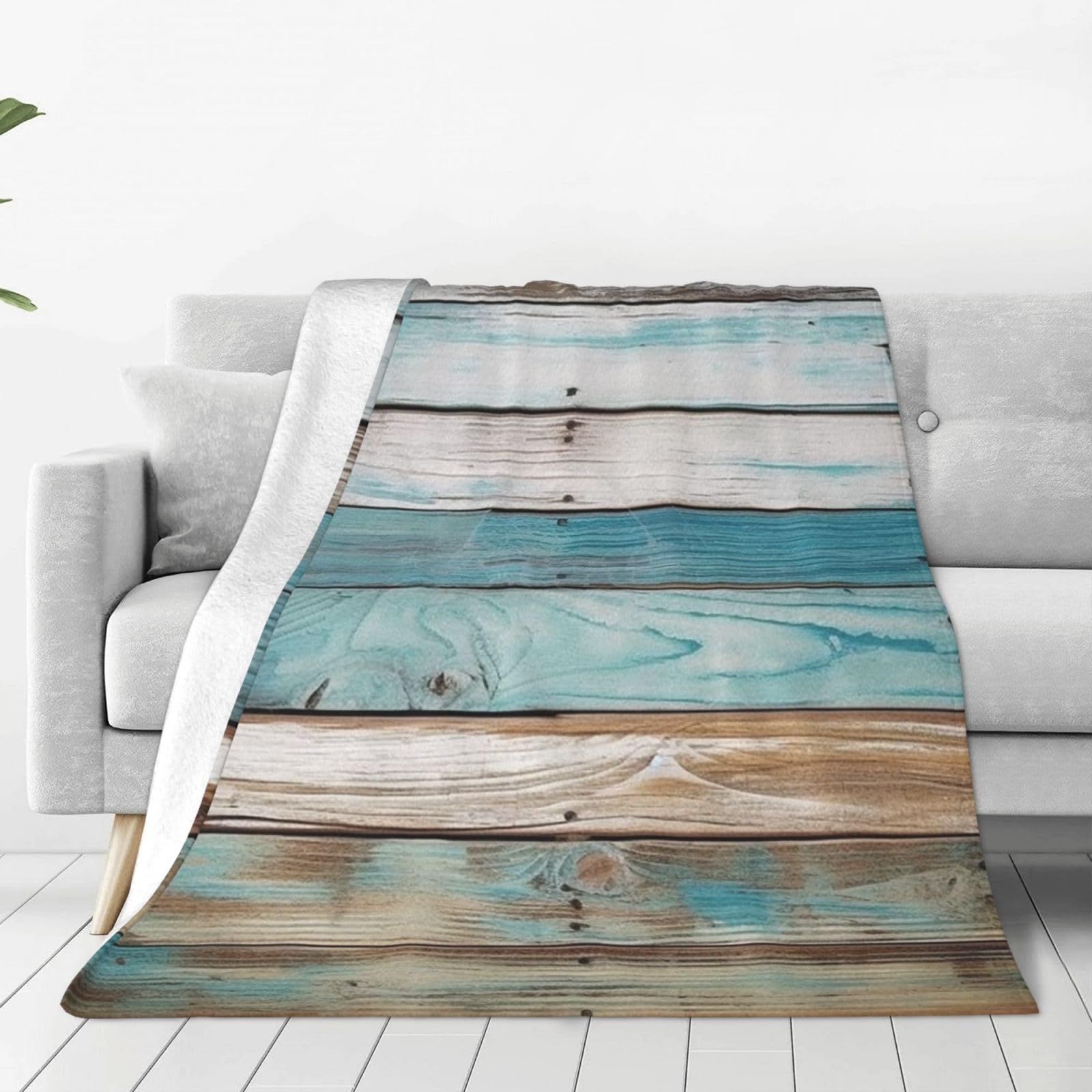 Plaid canapé bleu vieilli effet bois pour des soirées cocooning chaleureuses au salon