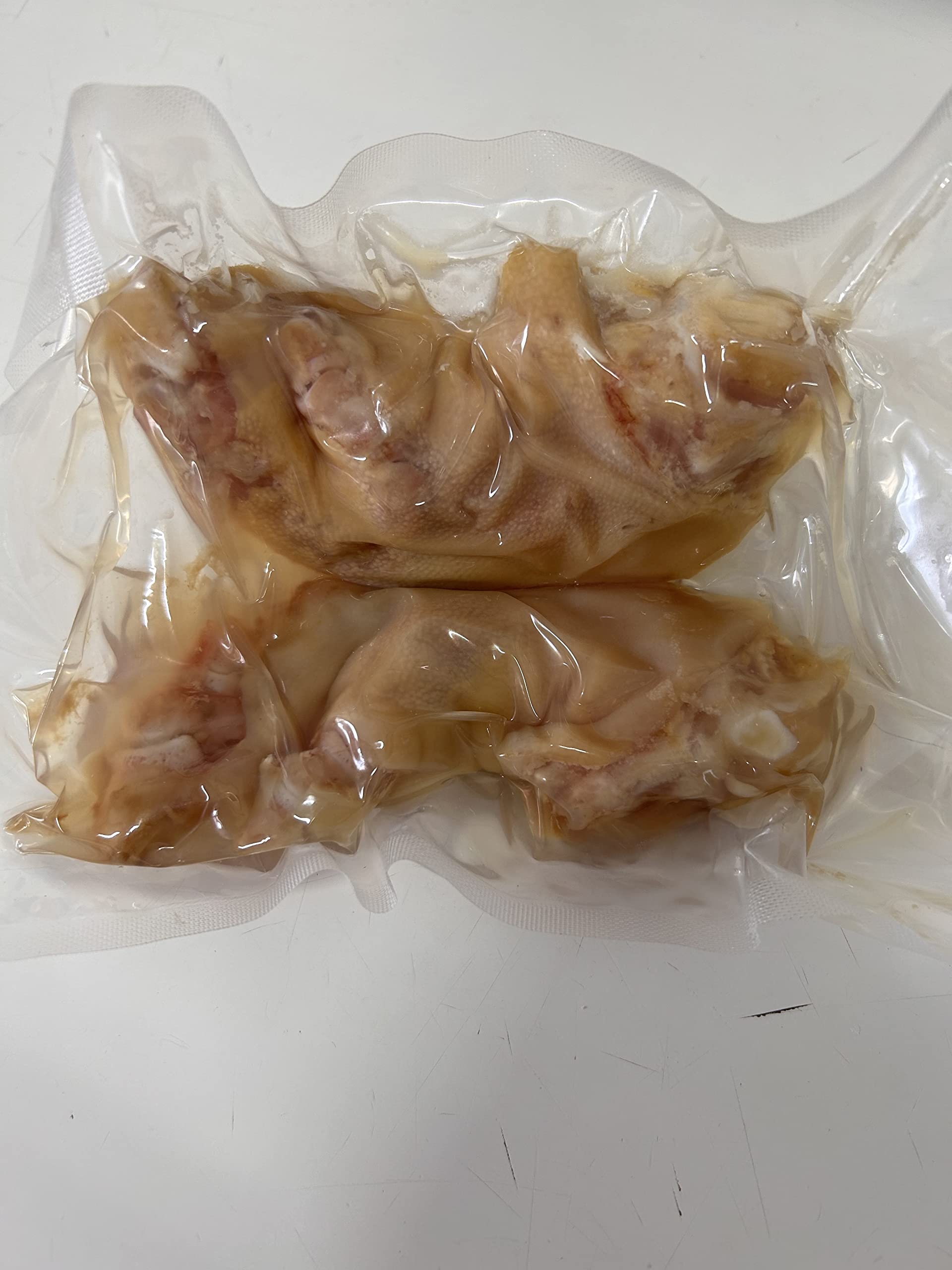 Manitas de cerdo cocidas en su jugo 12 piezas