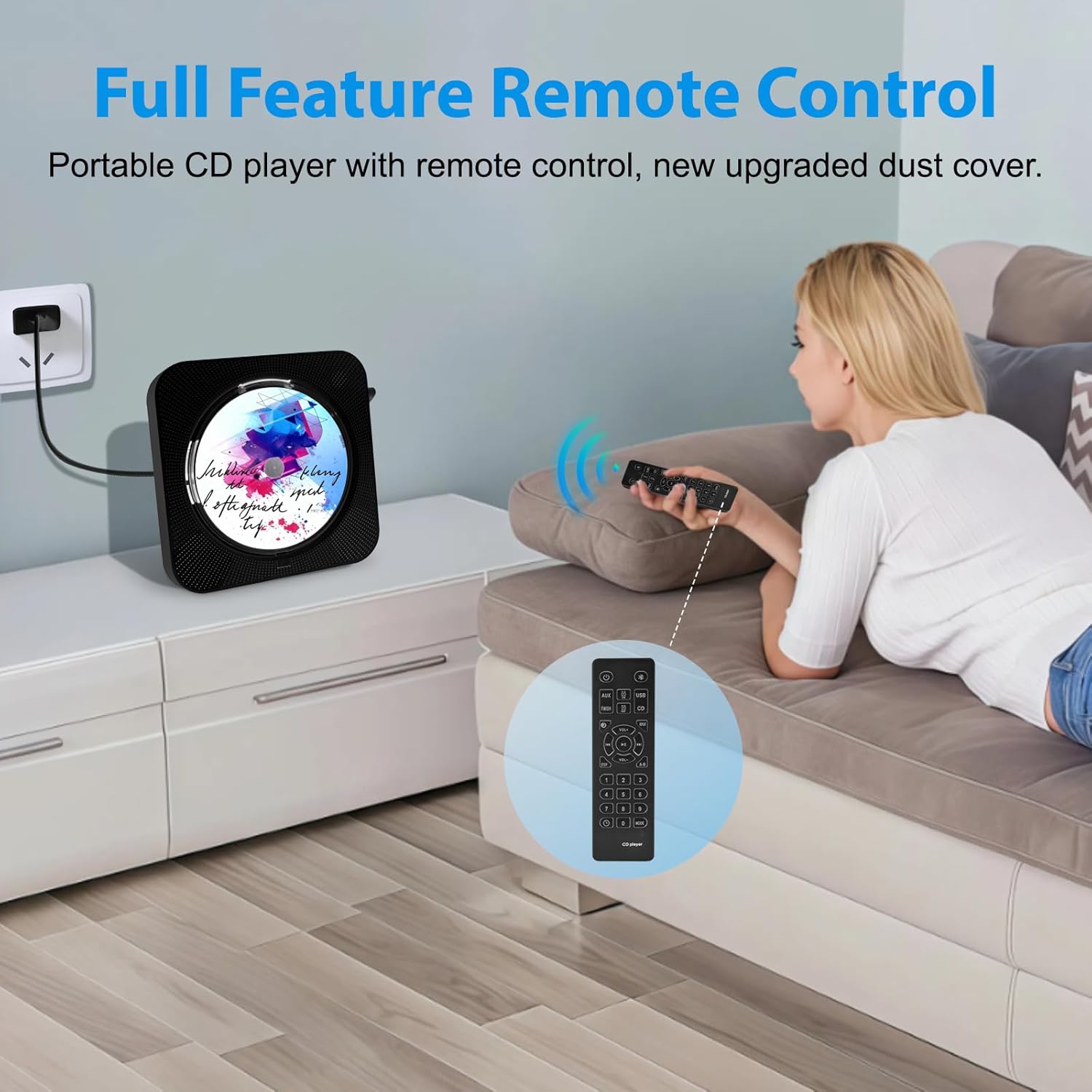 Person using the remote control for Austepax CD Player