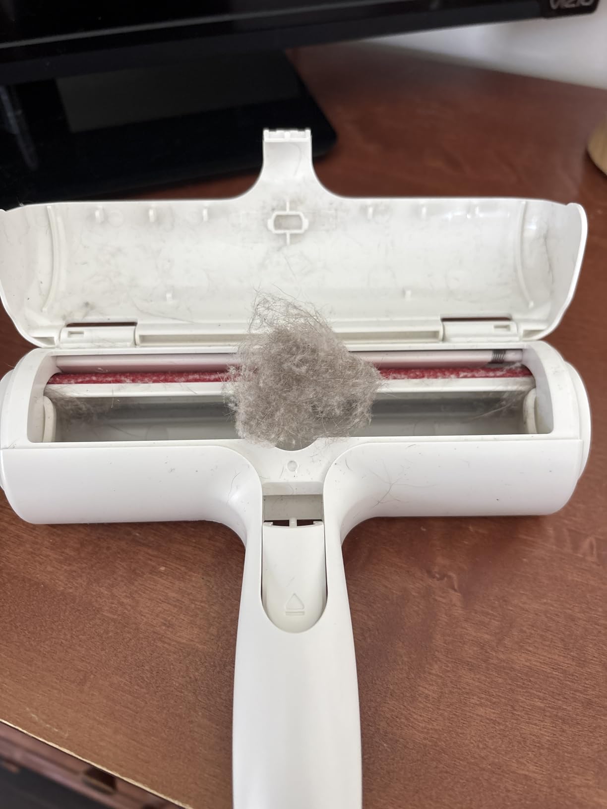 ChomChom Roller Pet Hair Remover and Reusable Lint Roller - Cat and Dog Hair Remover for Furniture, Couch, Carpet, Clothing and Bedding - Portable, Multi-Surface Fur Removal Tool (White) photo review