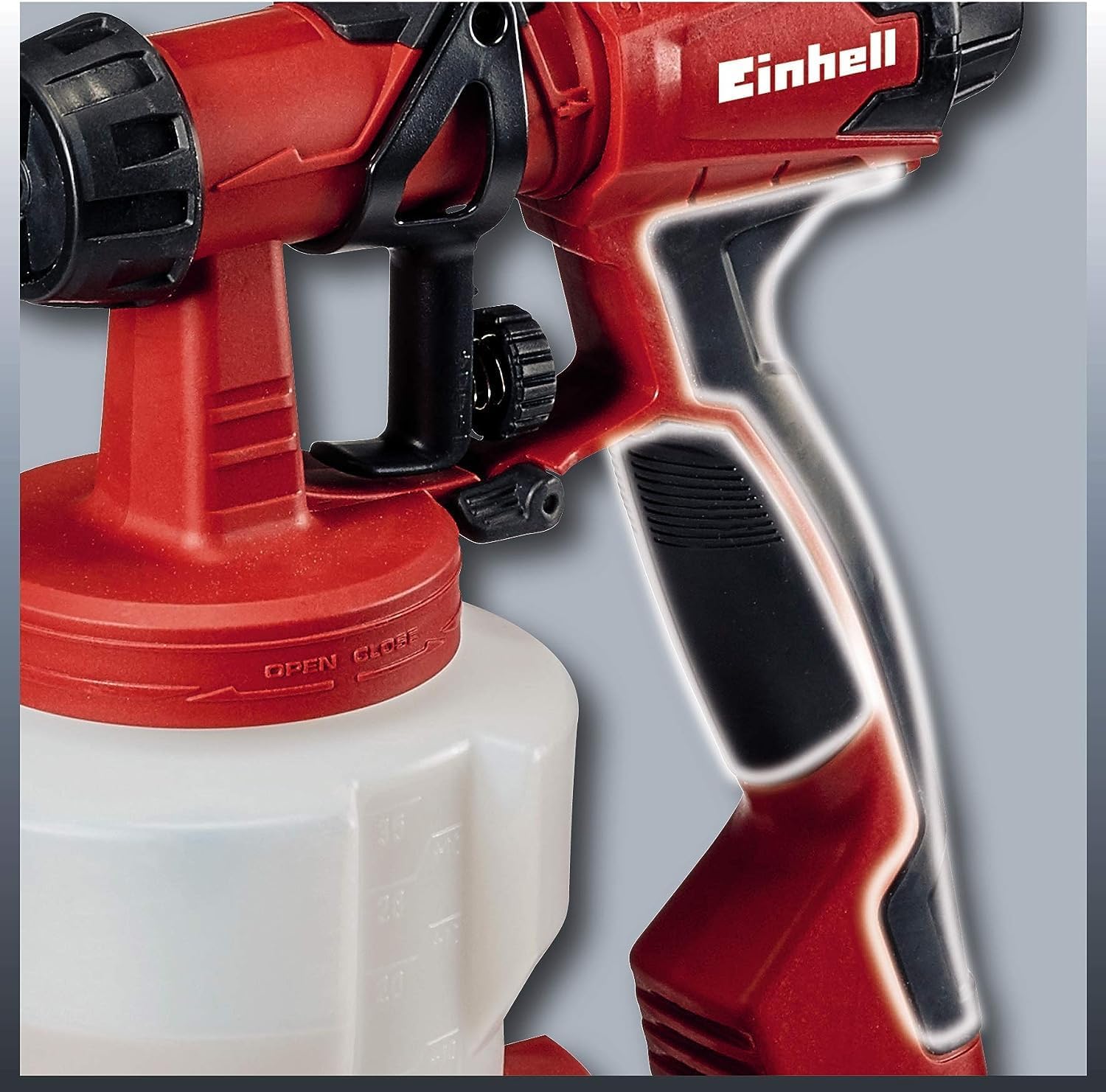 Close-up of the ergonomic soft-grip handle of the Einhell TC-SY 700 S paint spray gun