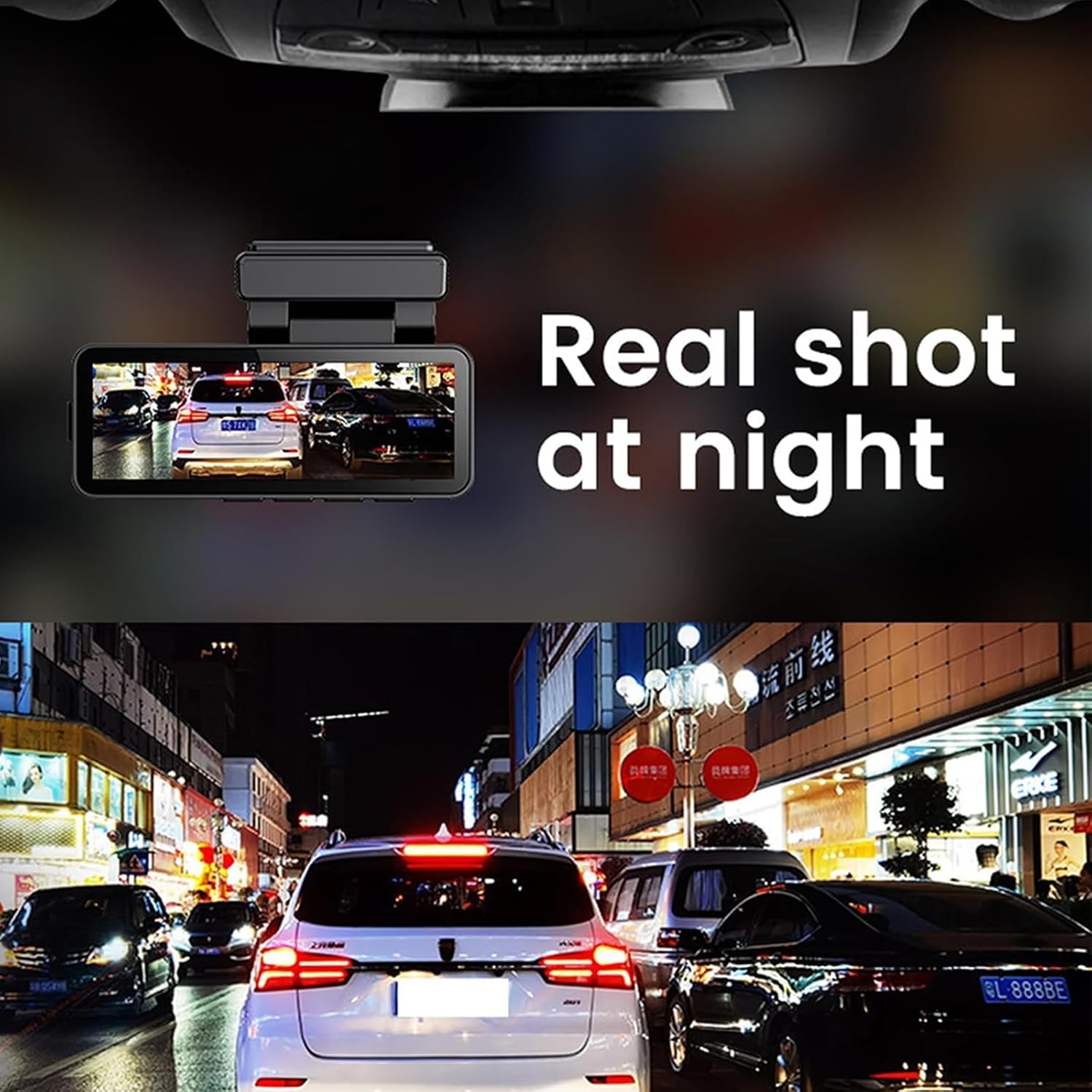 Dashcam mounted in a car, showing a night view of traffic from the rear camera