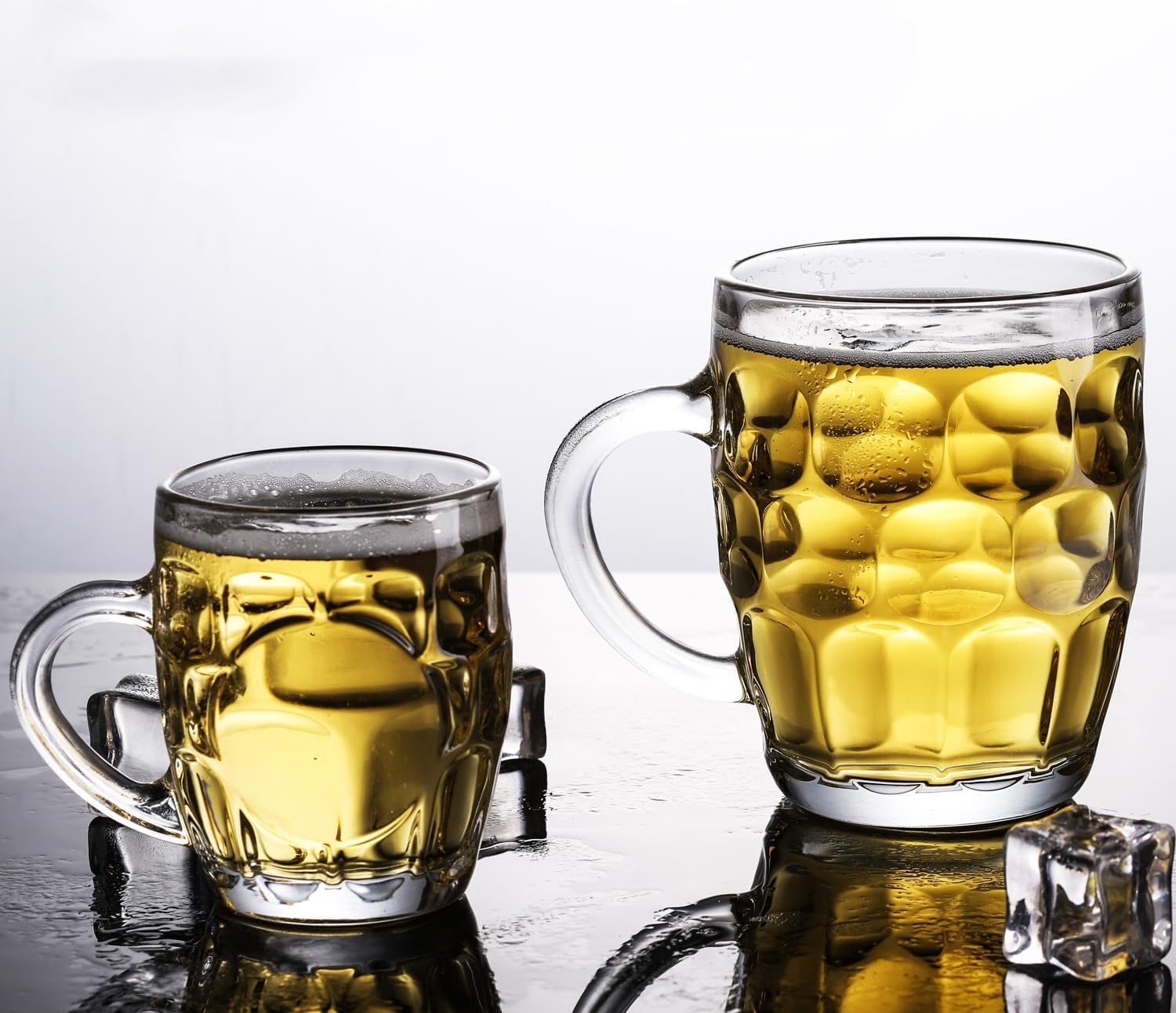 2 tazas de cerveza con hoyuelos de cristal con mango grande – 538 g – Apto para lavavajillas – para todas las bebidas (2, textura con hoyuelos)