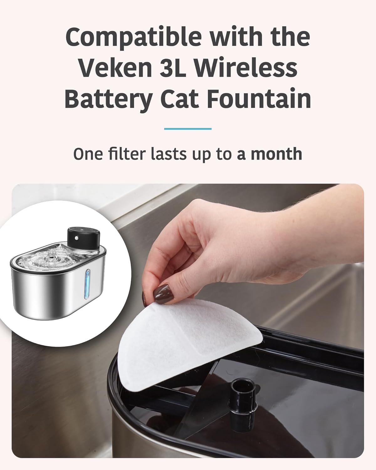 Hand inserting a Veken replacement filter into a Veken 3L Wireless Cat Fountain.
